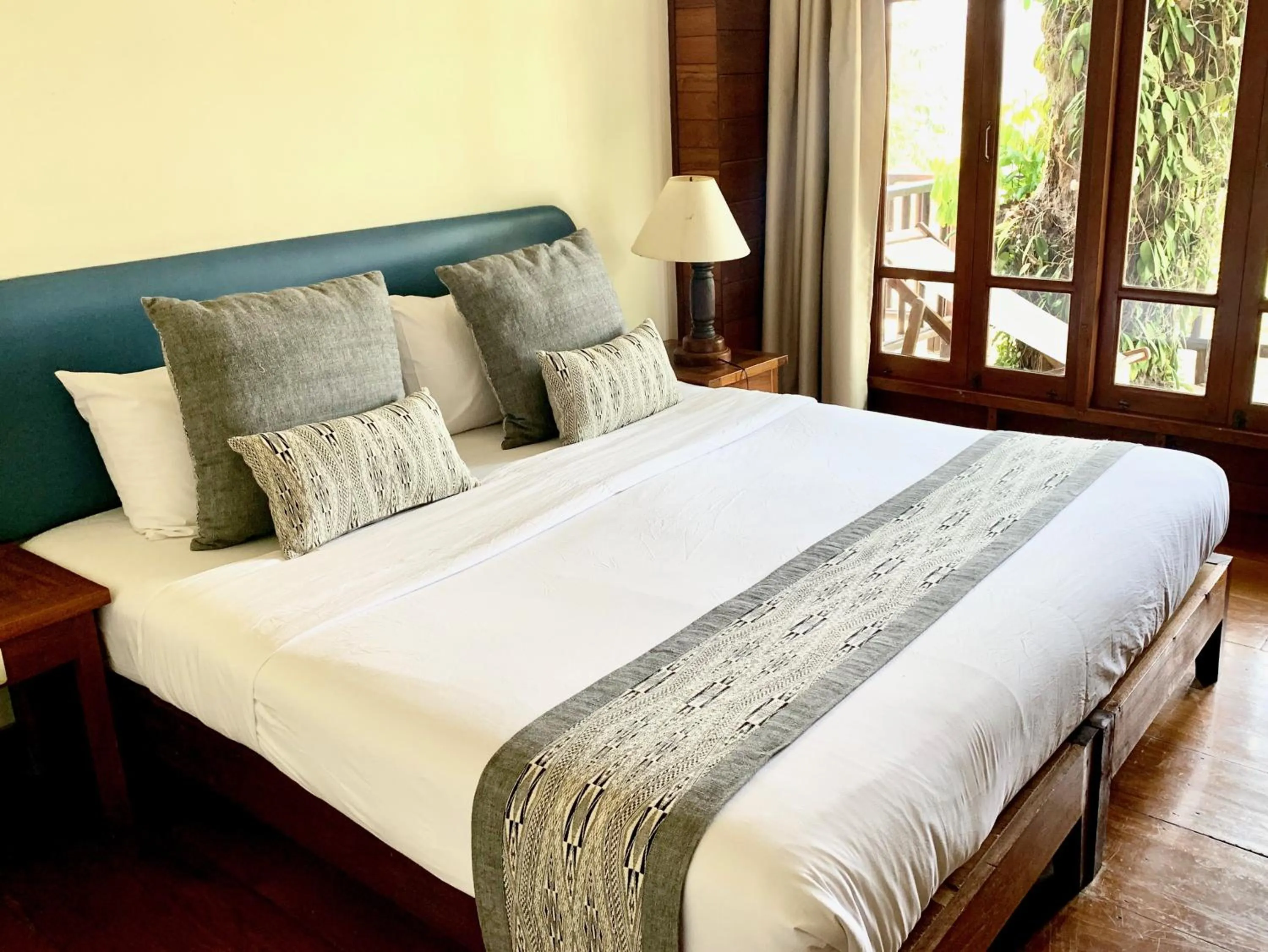 Bed in Riverhouse-The Teak House