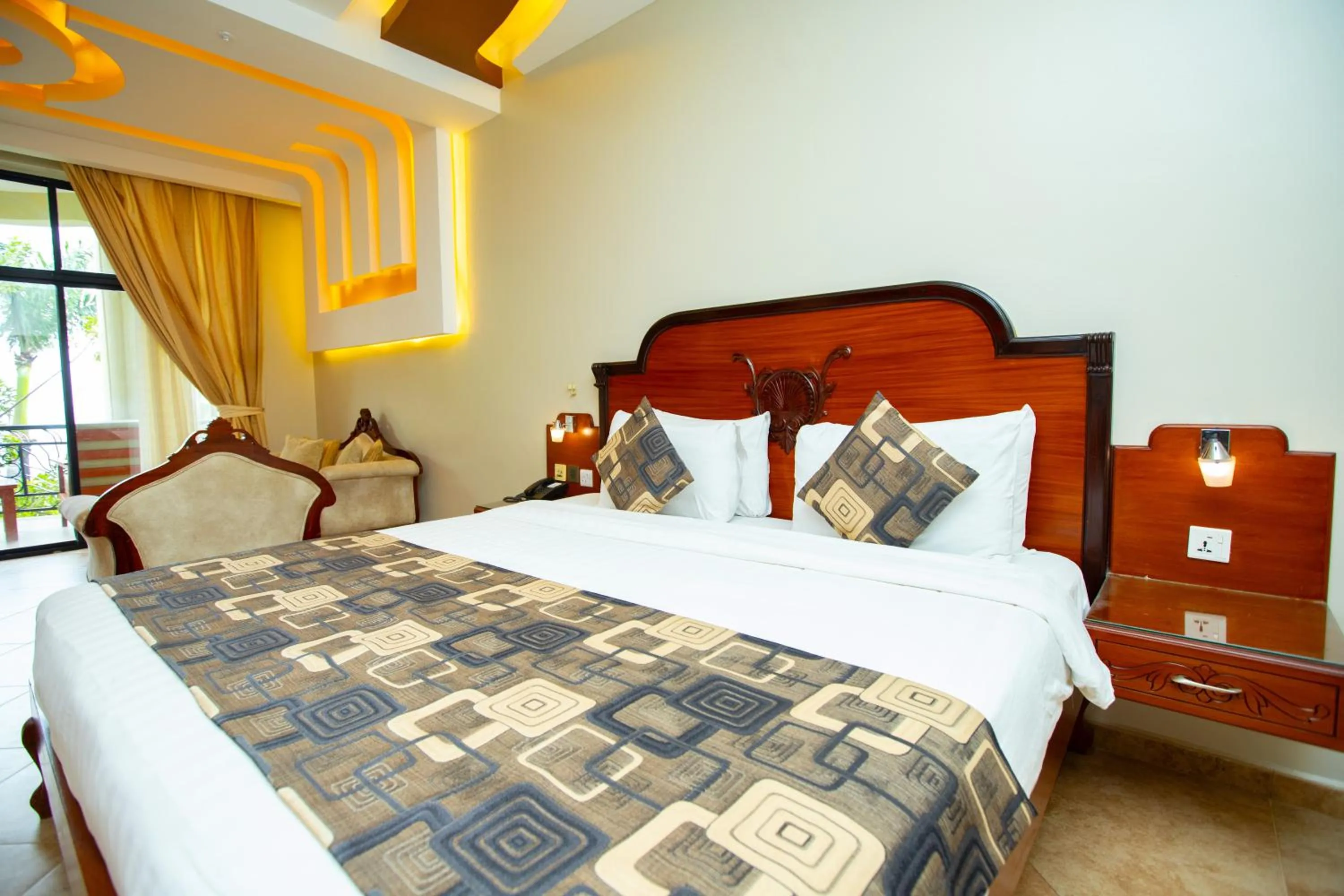 Bed in Malaika Beach Resort