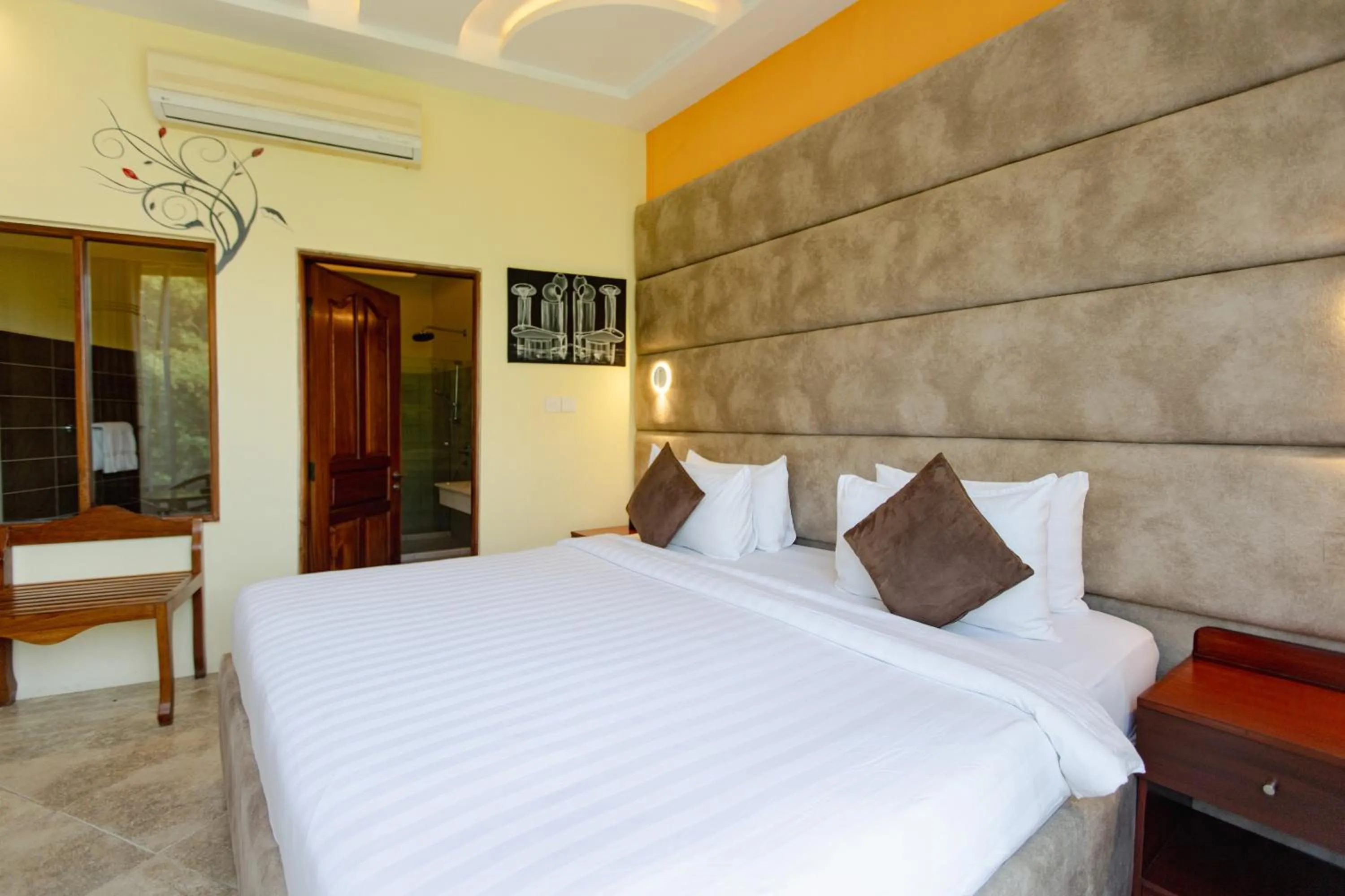 Bed in Malaika Beach Resort