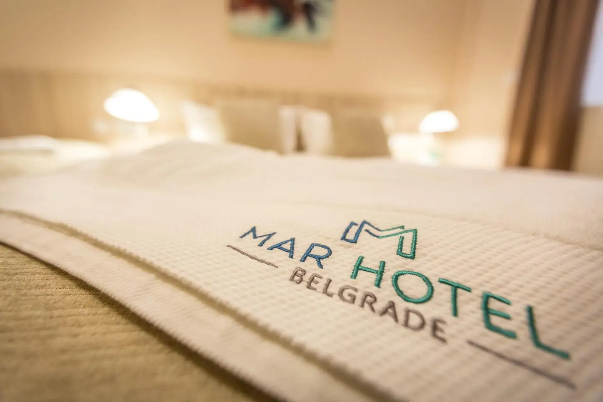 Property logo or sign, Bed in Hotel Mar Garni Property logo or sign, Bed in Hotel Mar Garni