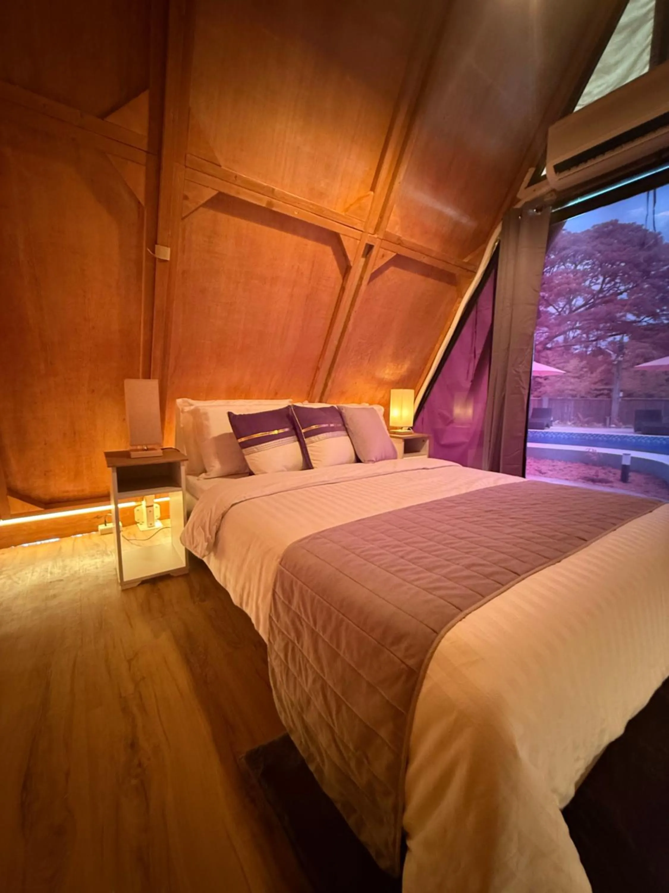 Bed in Aquamare Beach Camp Resort