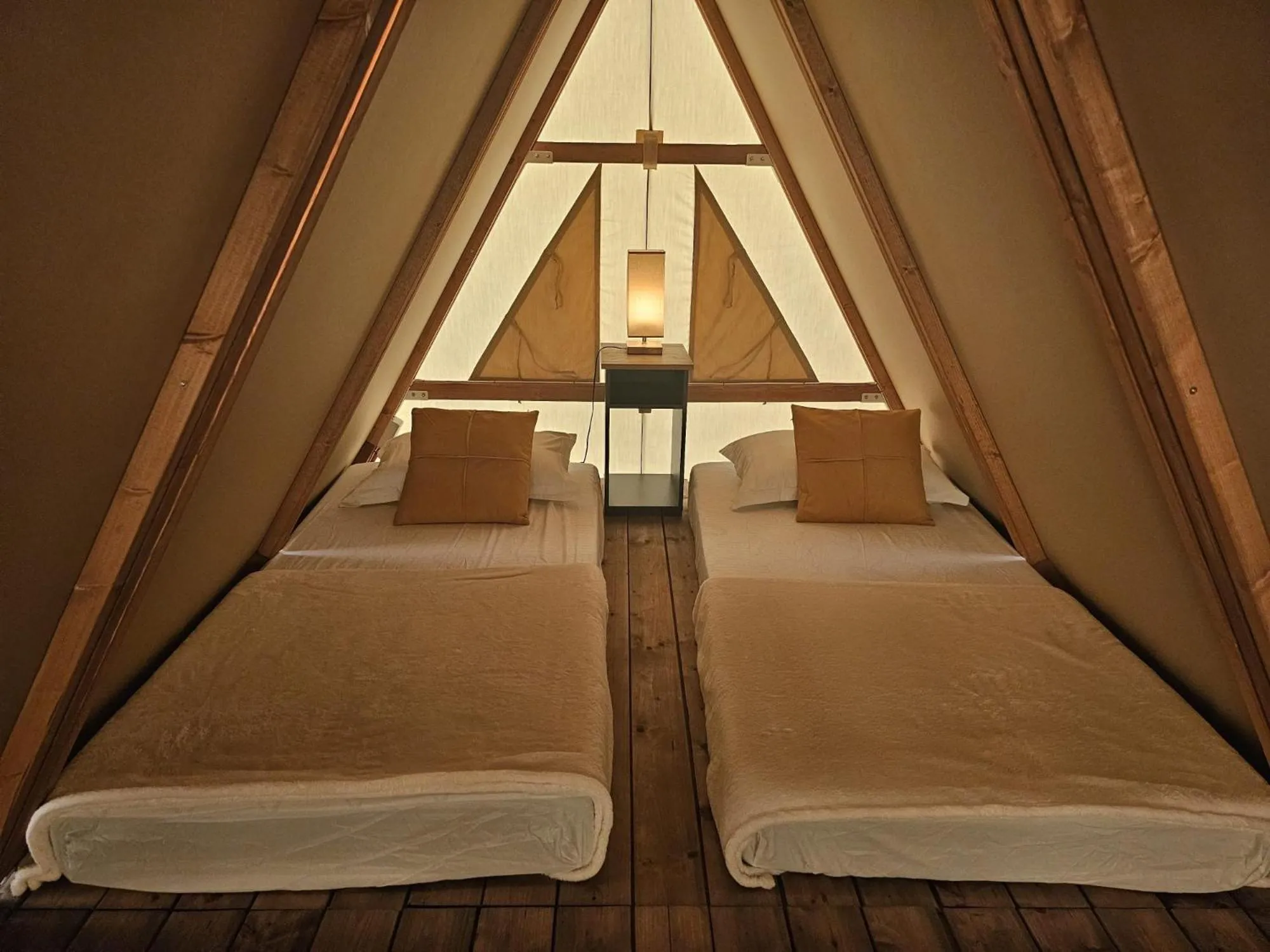 Bed in Aquamare Beach Camp Resort