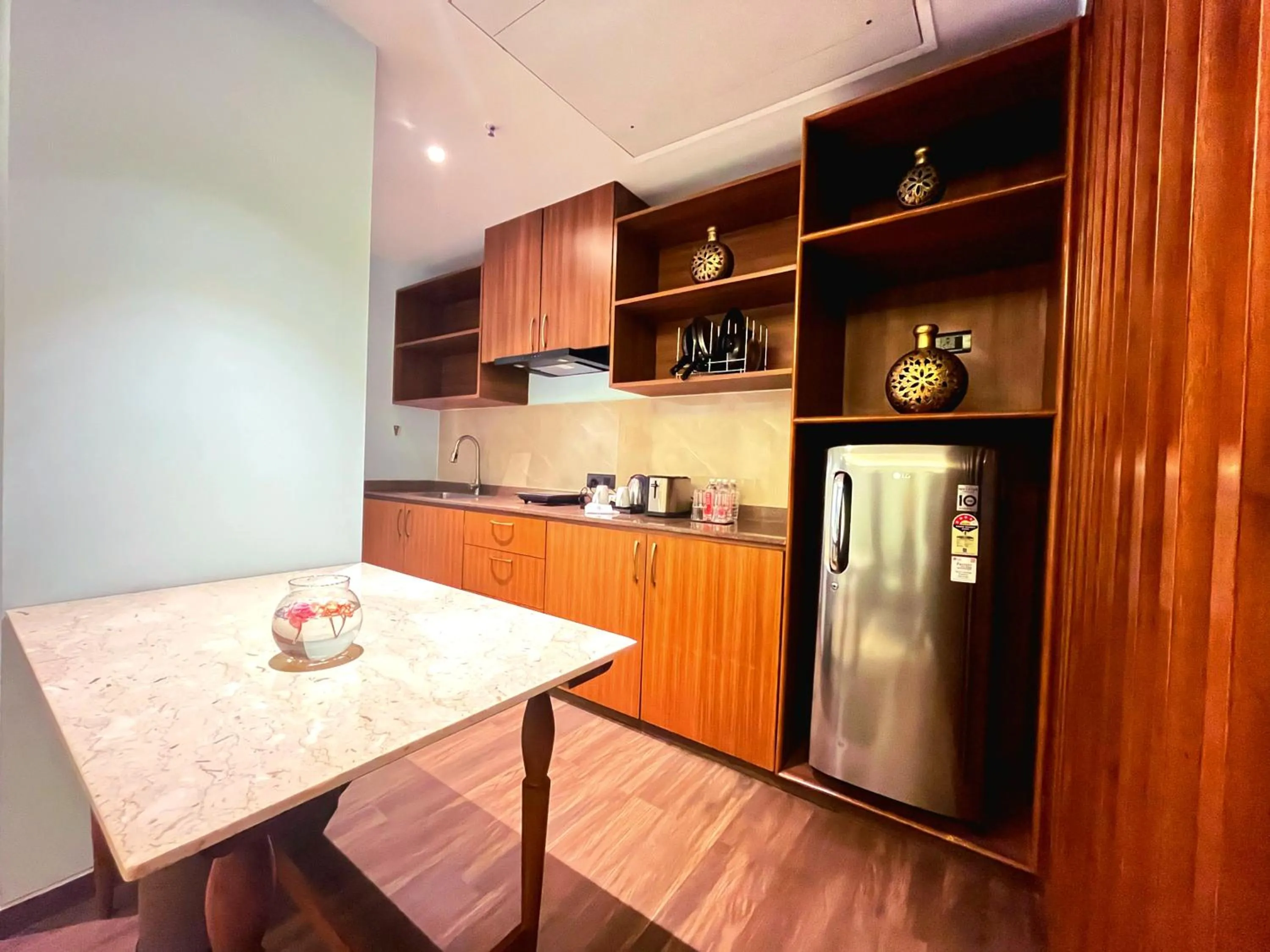 Kitchen or kitchenette in Gift City Club, a member of Radisson Individuals