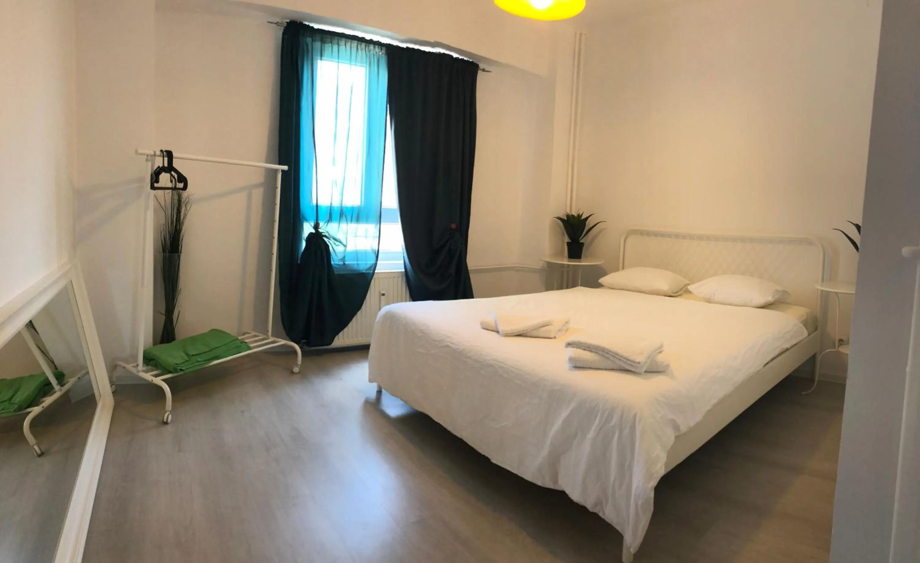 Bedroom, Bed in Green Apartment 63