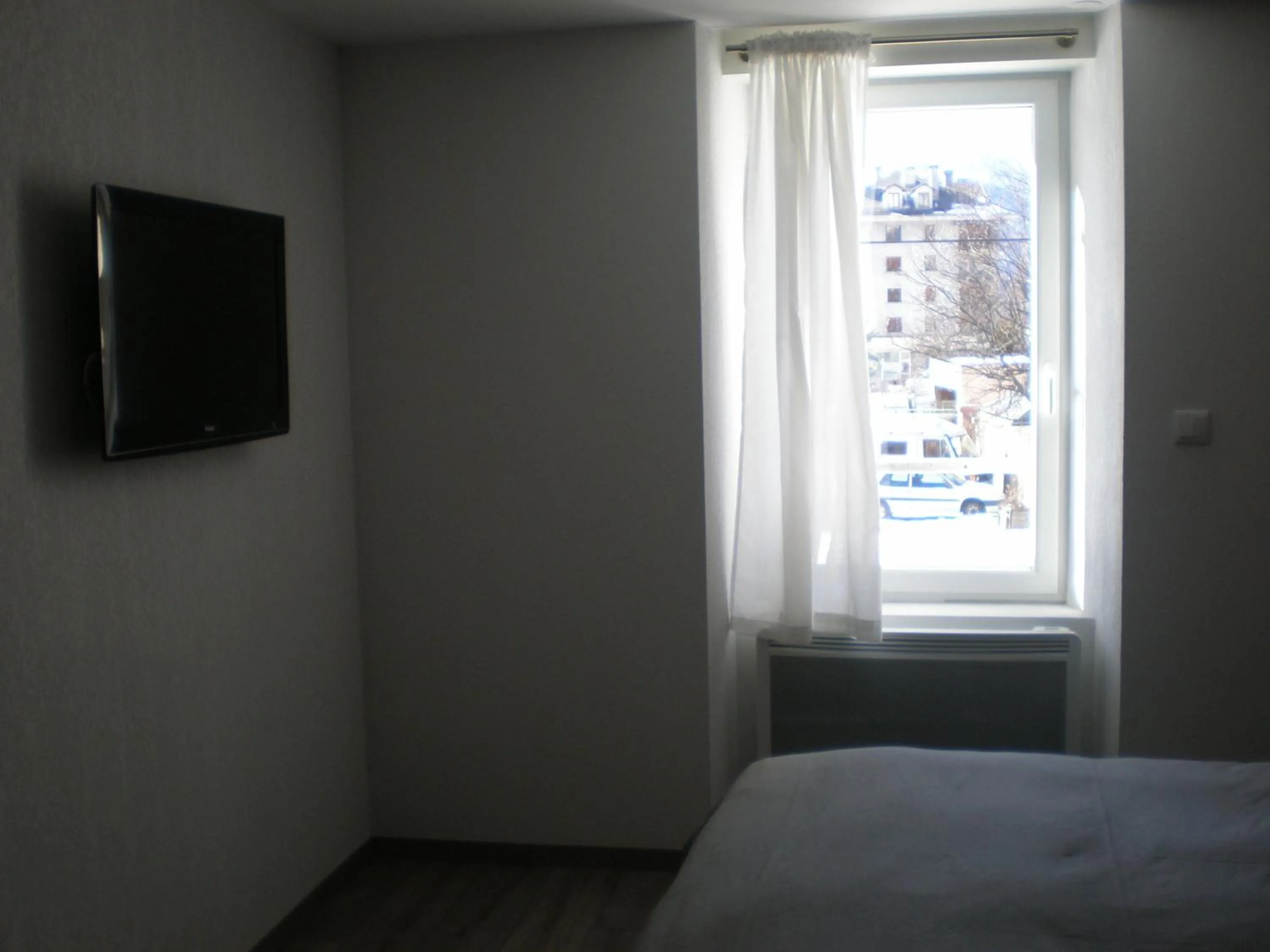 Bed in Appart Hotel de la Paix