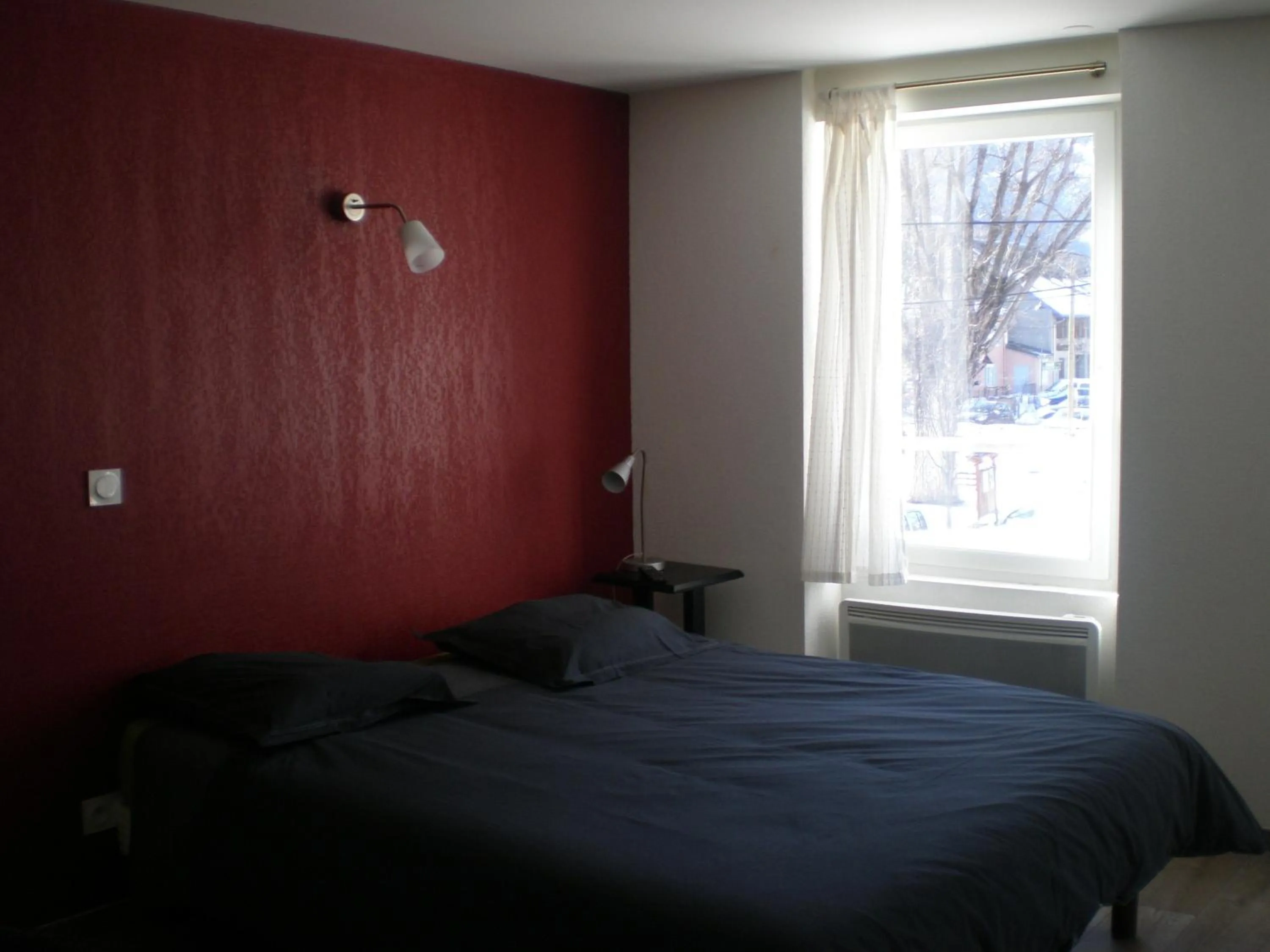 Bed in Appart Hotel de la Paix