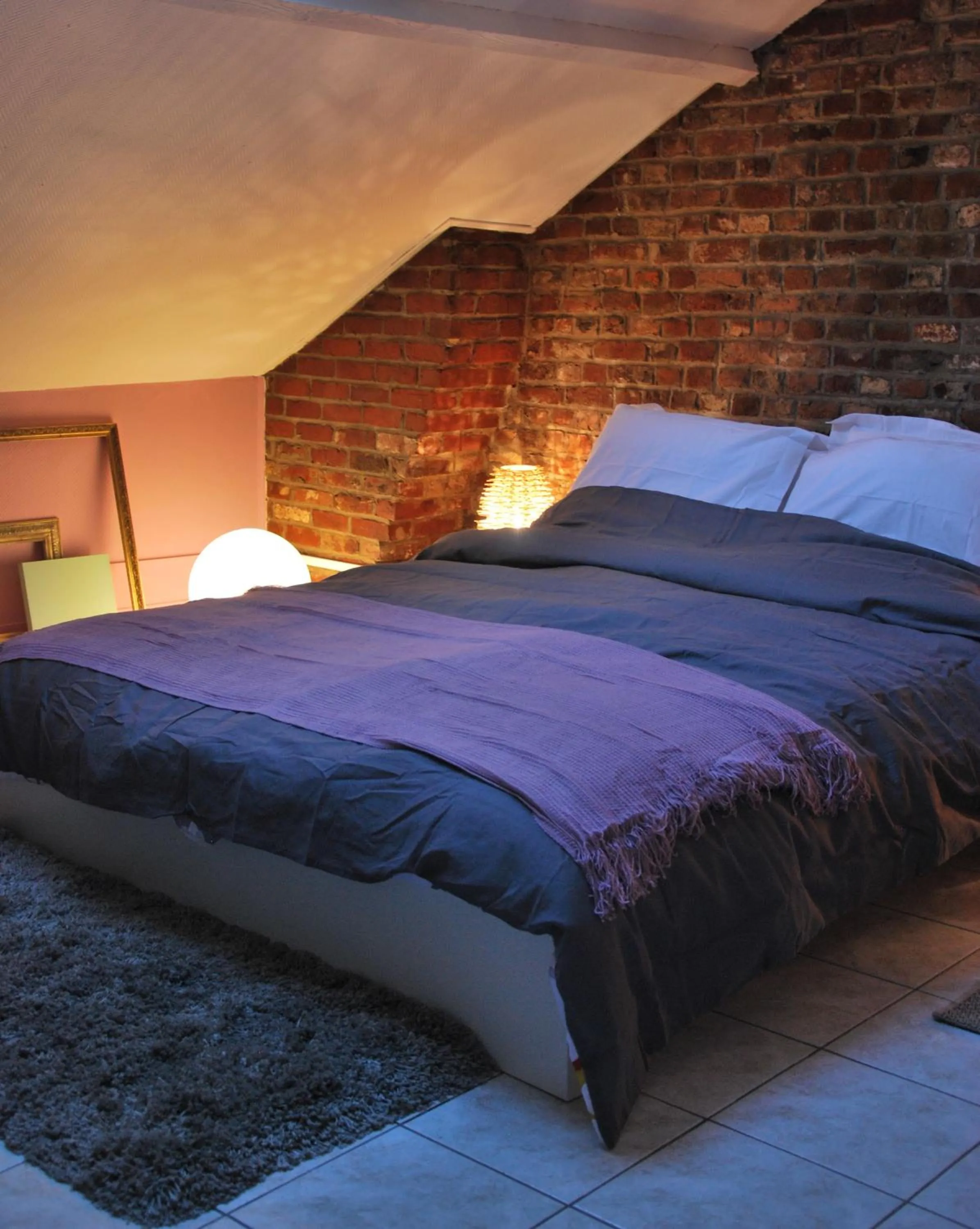 Photo of the whole room, Bed in Les studios de la grand Place