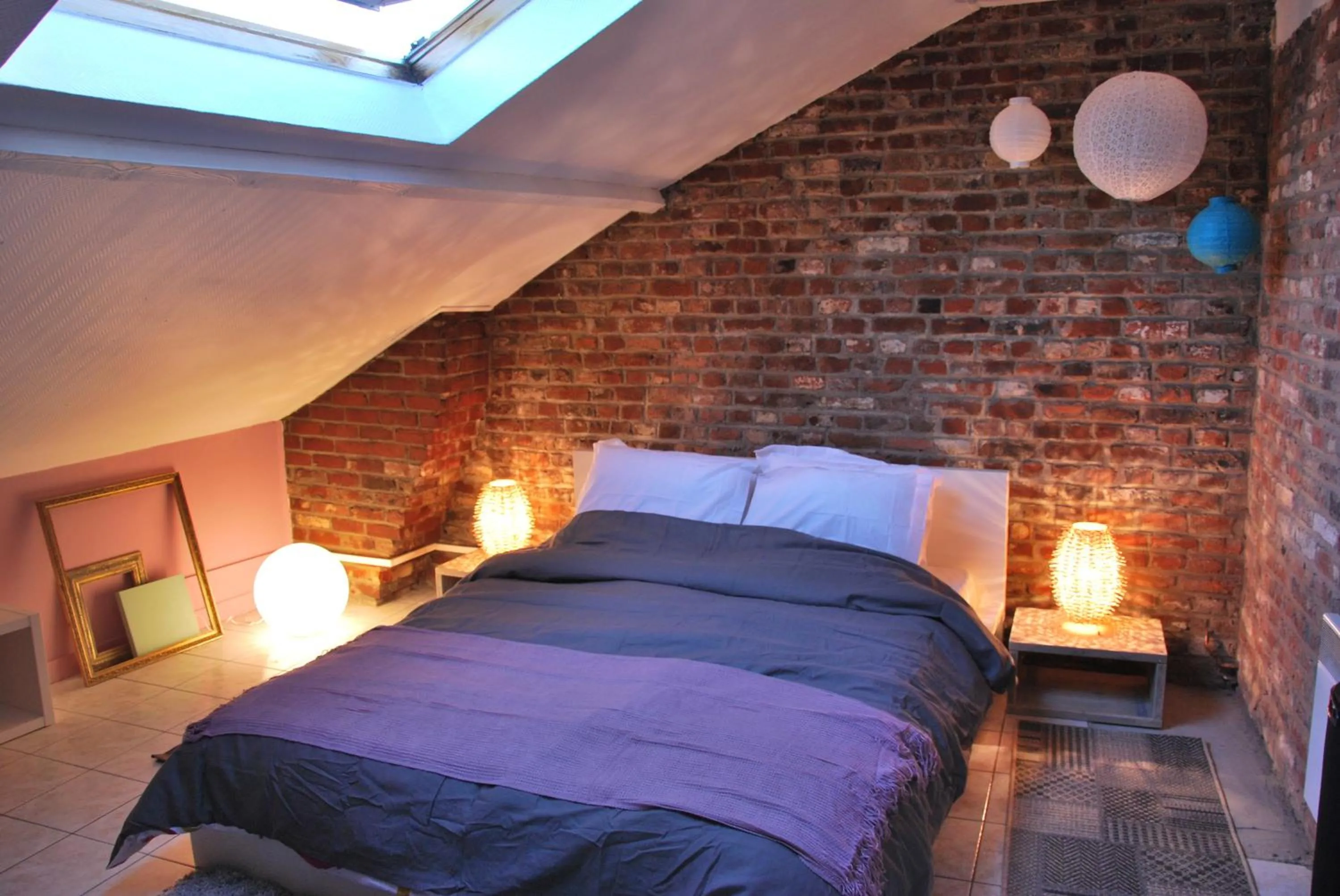 Photo of the whole room, Bed in Les studios de la grand Place