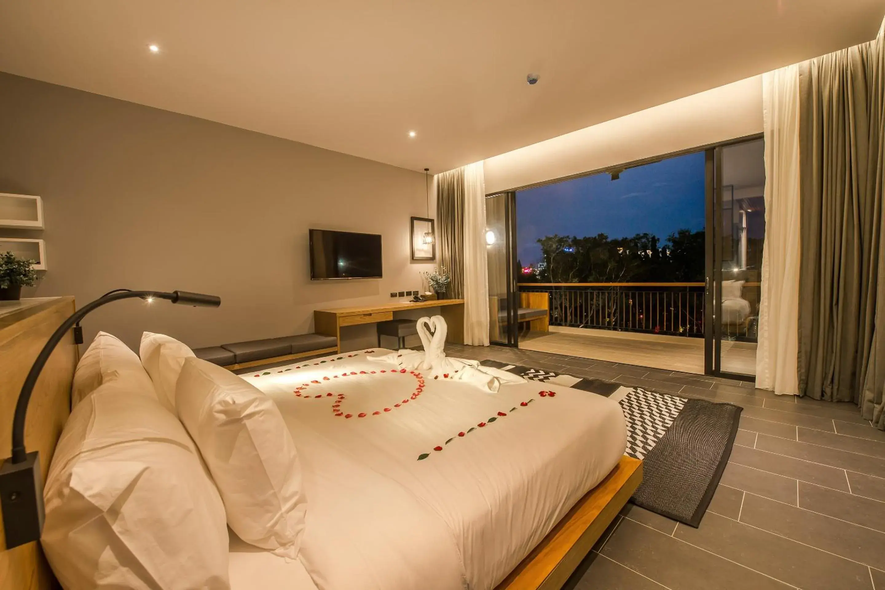 Communal lounge/ TV room, Bed in The Gallery Hotel Nai Harn Communal lounge/ TV room, Bed in The Gallery Hotel Nai Harn