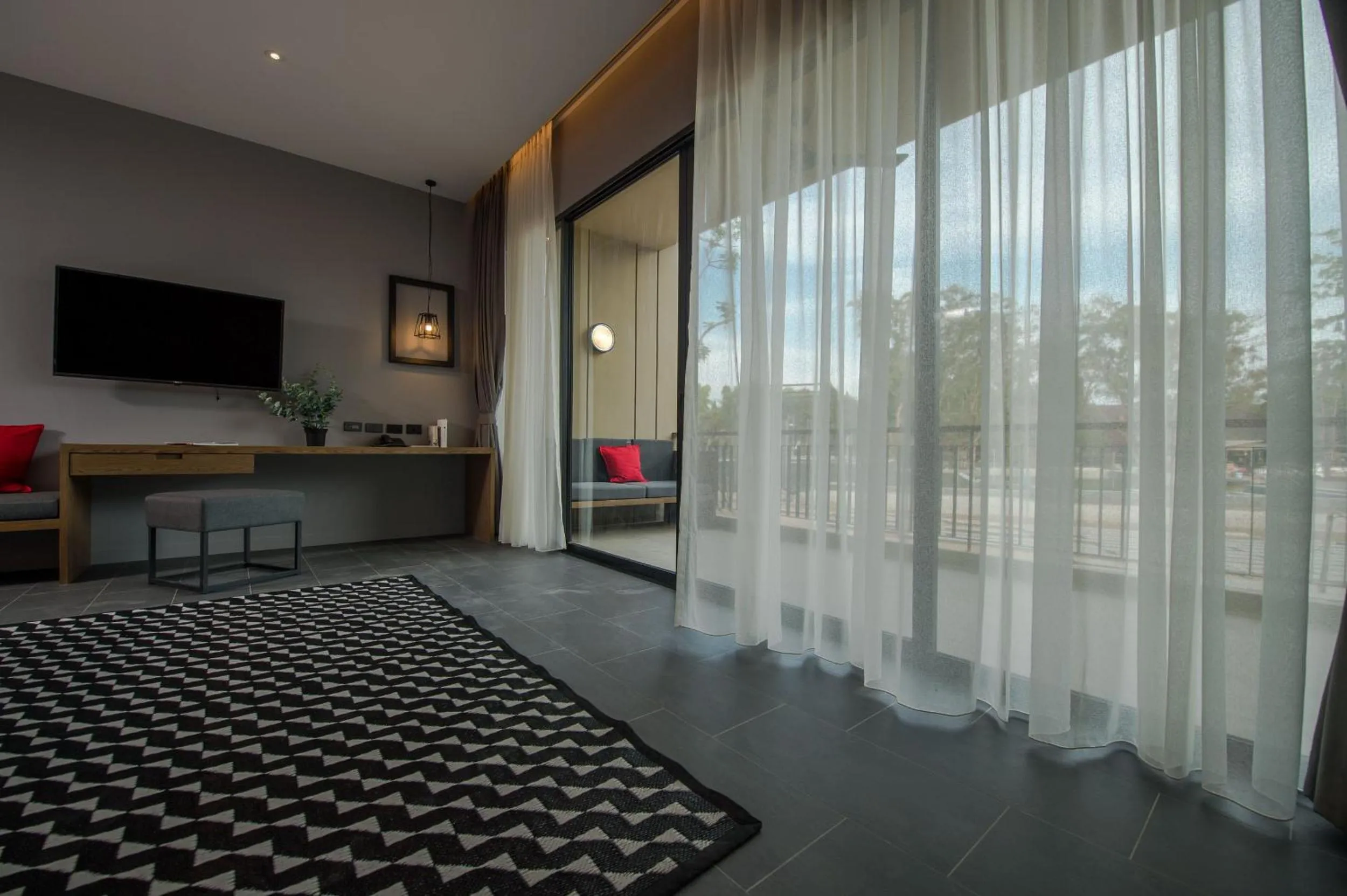 Bed in The Gallery Hotel Nai Harn