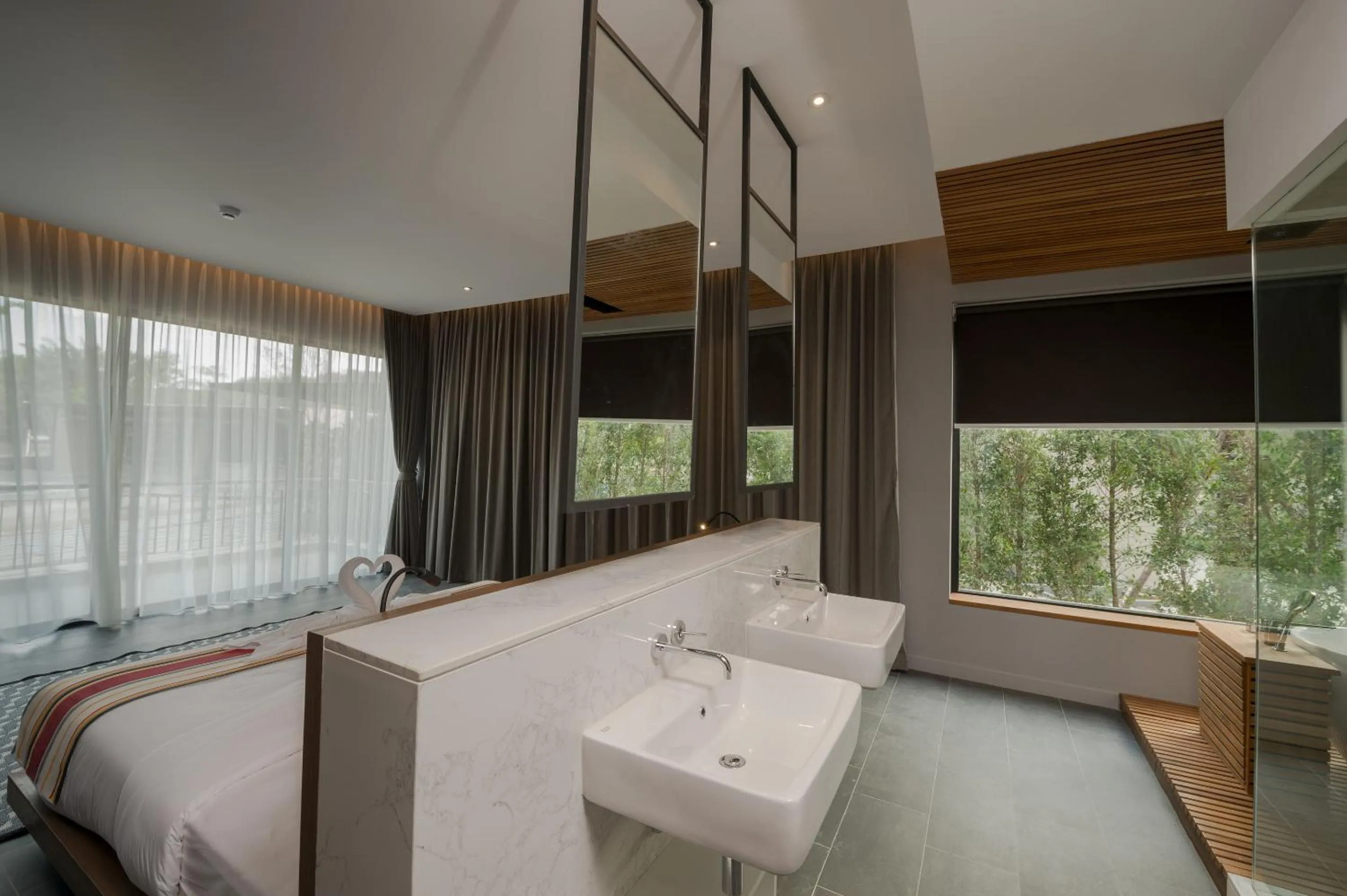 Bed in The Gallery Hotel Nai Harn