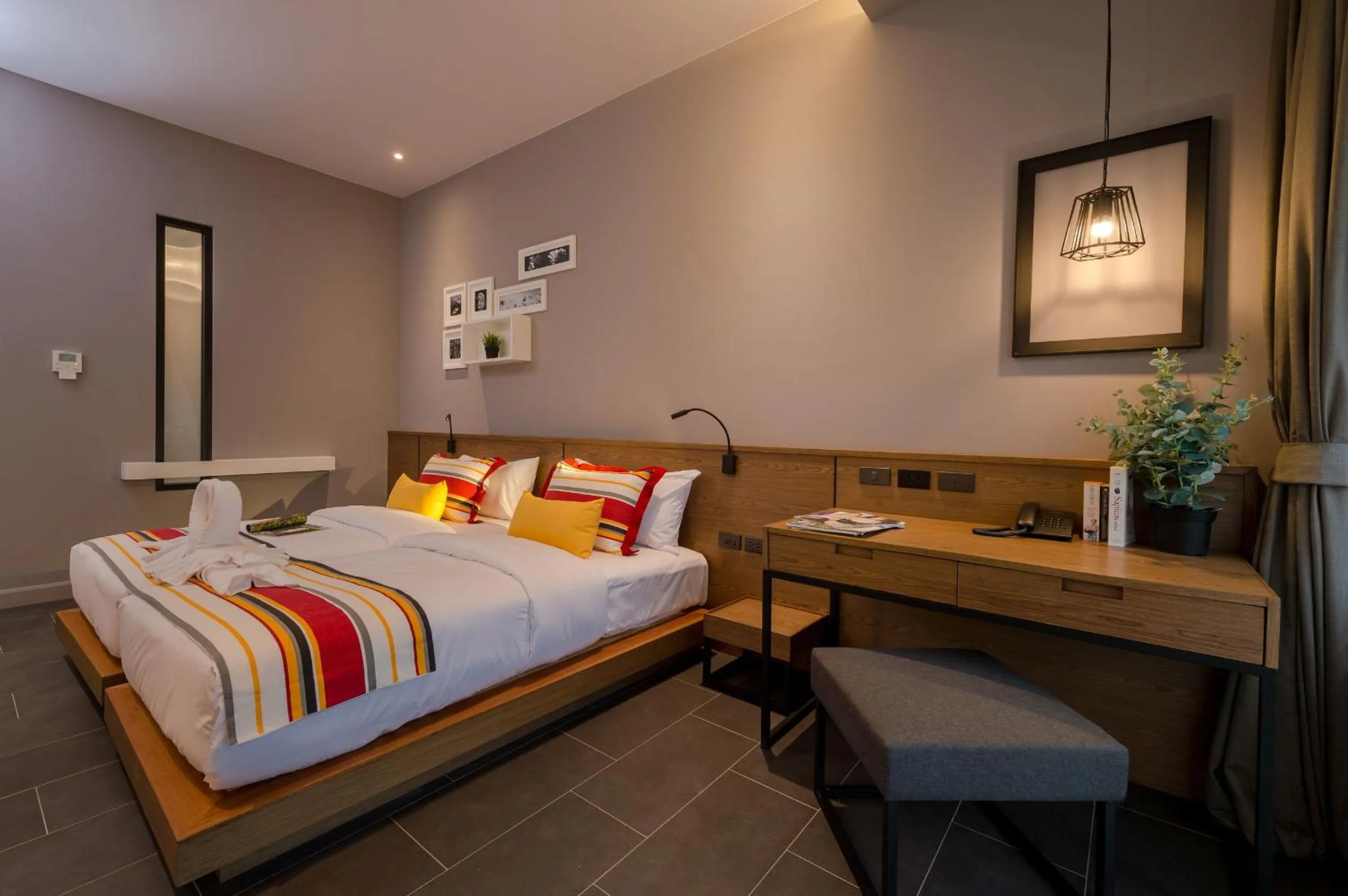 Bed in The Gallery Hotel Nai Harn