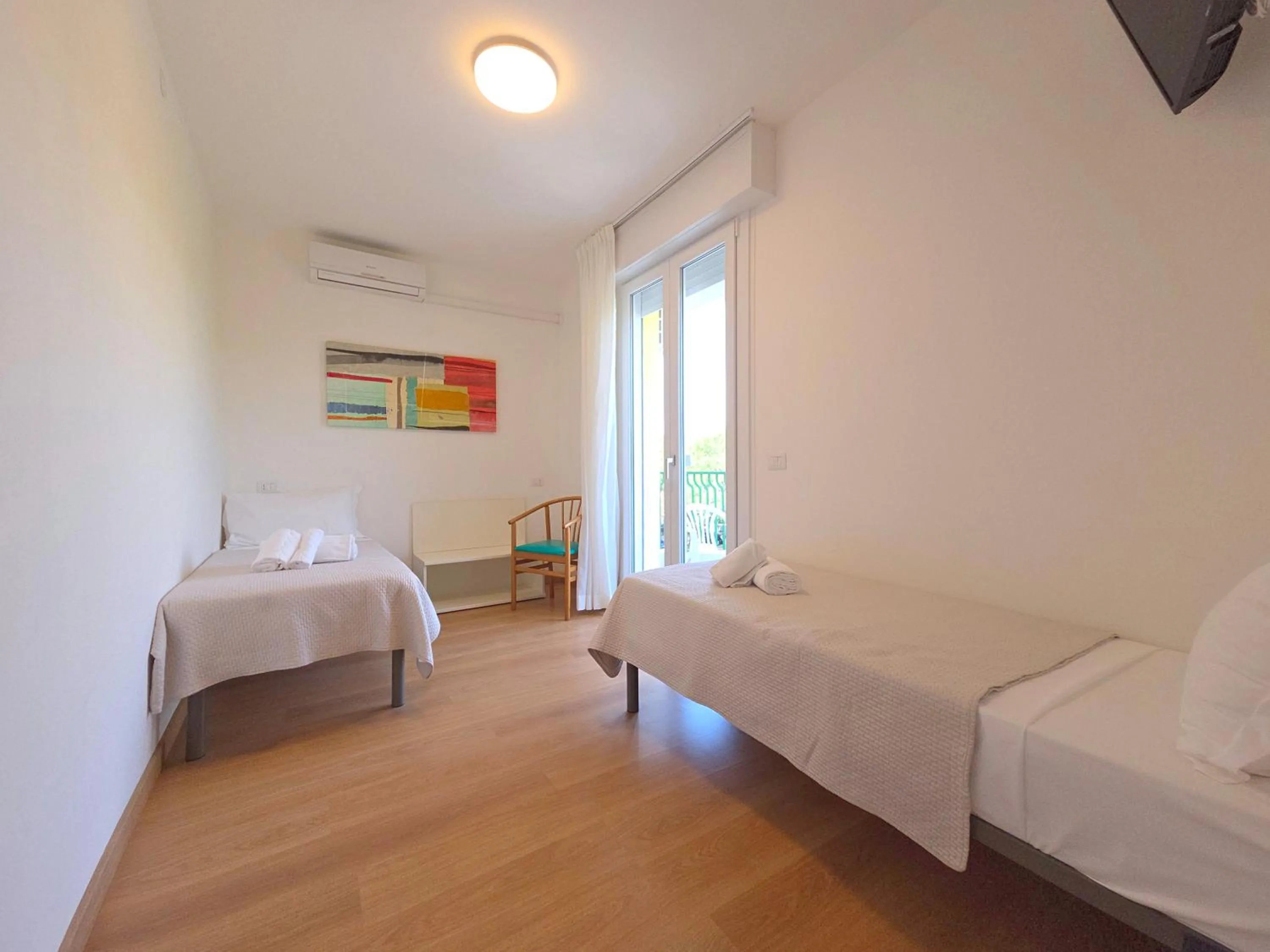 Bed in Hotel Royal Garnì