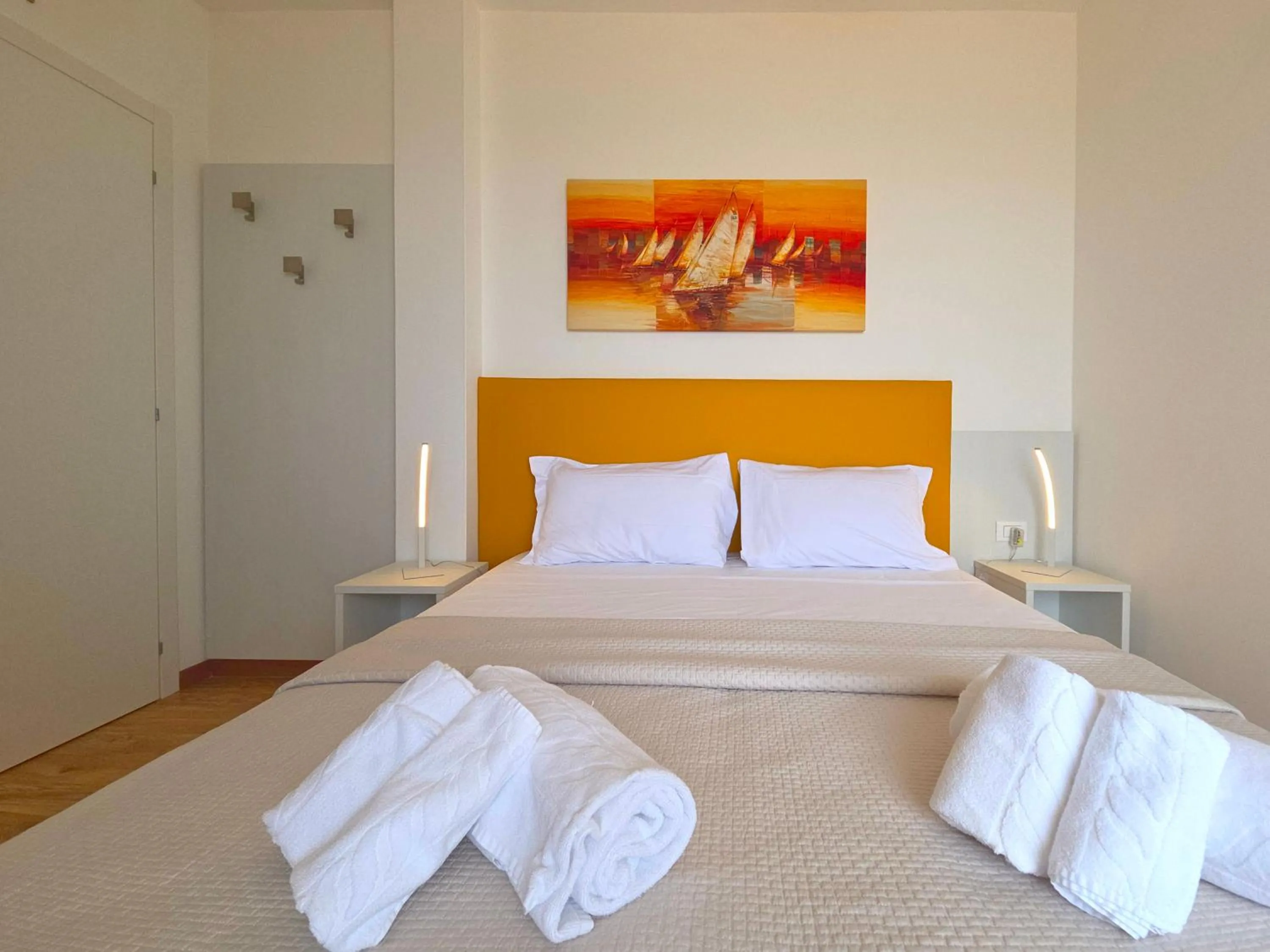 Bed in Hotel Royal Garnì