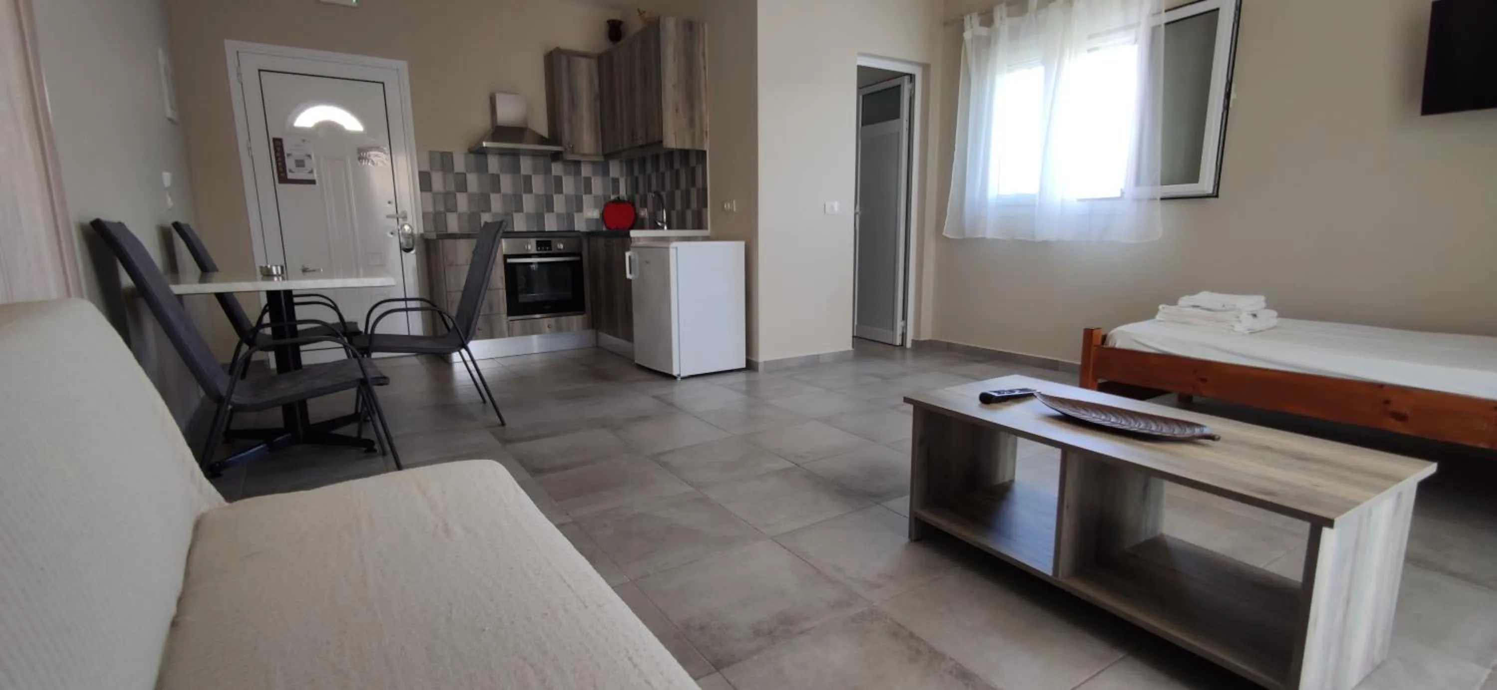 Kitchen or kitchenette in Casa De Rosa Apartments & Studios