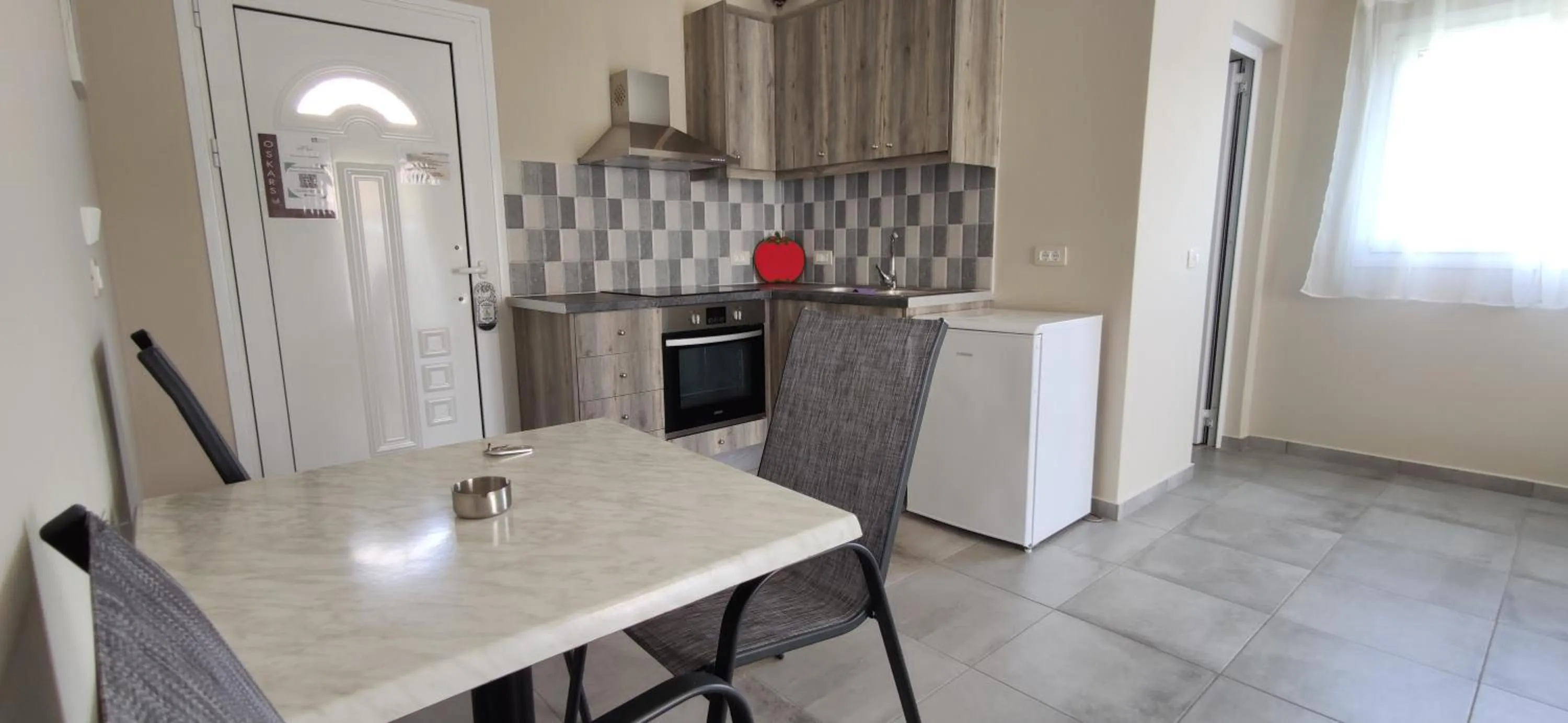 Kitchen or kitchenette in Casa De Rosa Apartments & Studios