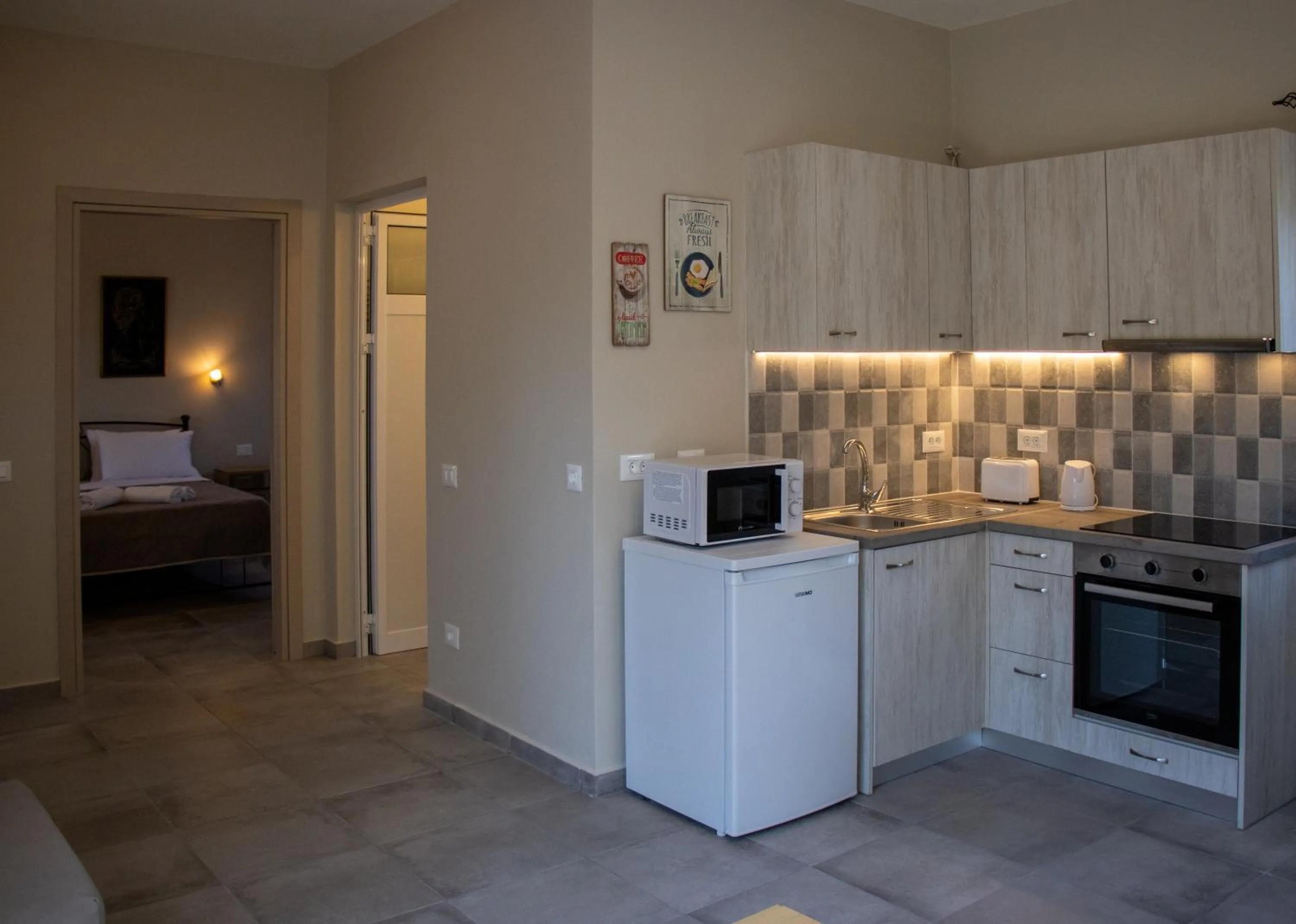 kitchen in Casa De Rosa Apartments & Studios
