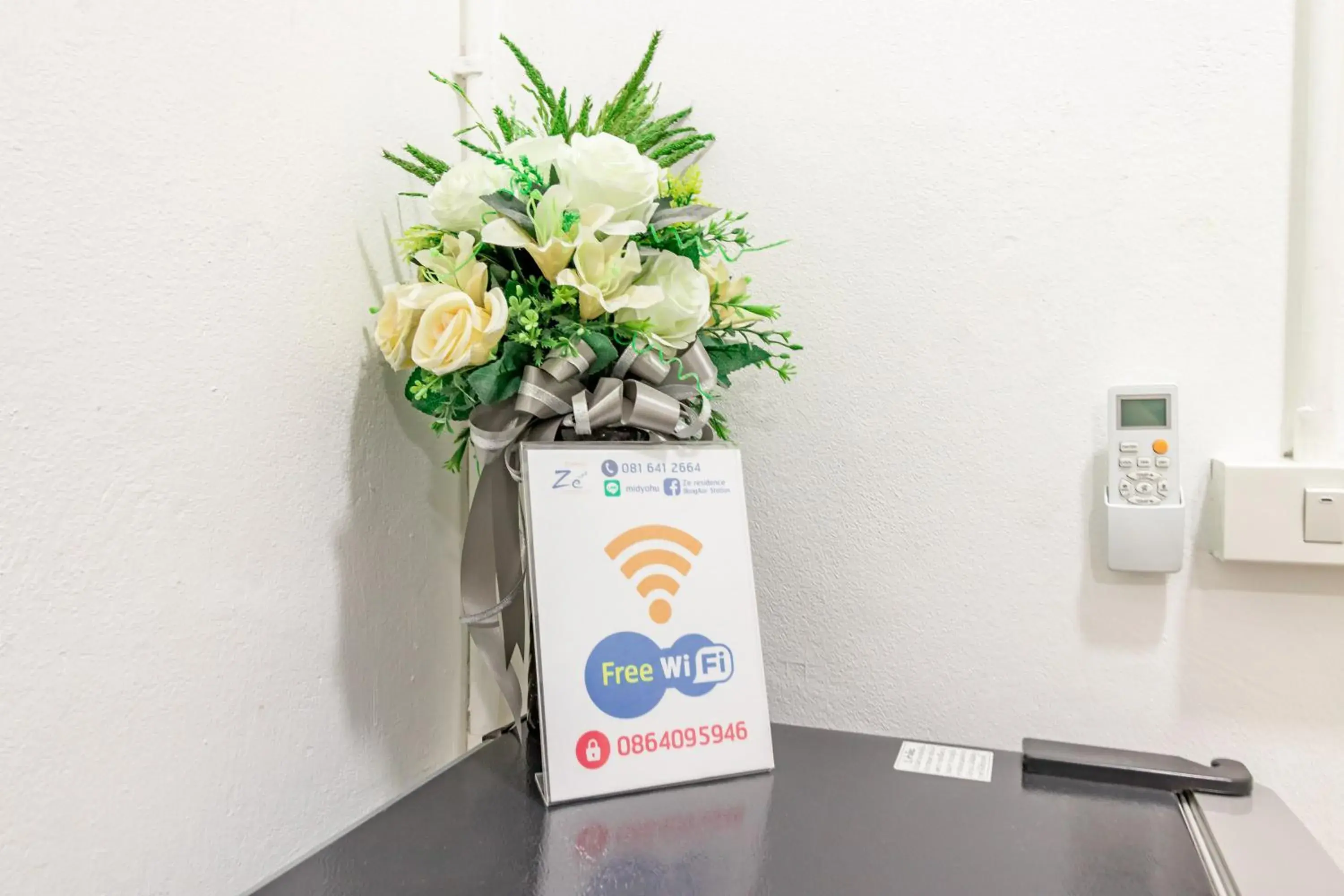 Property logo or sign in Ze Residence Bang Aor Station Property logo or sign in Ze Residence Bang Aor Station