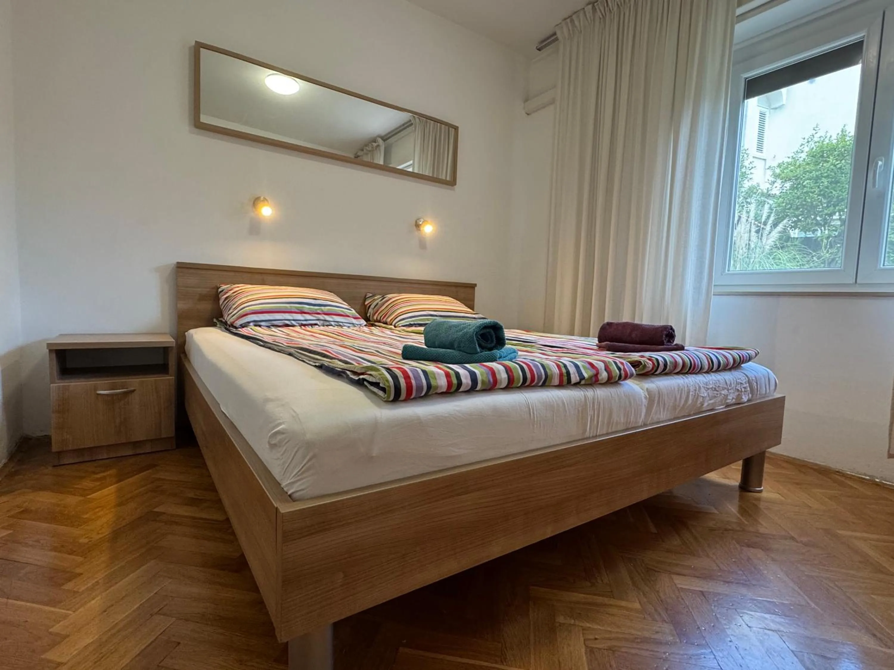 Bed in Apartments Jessica