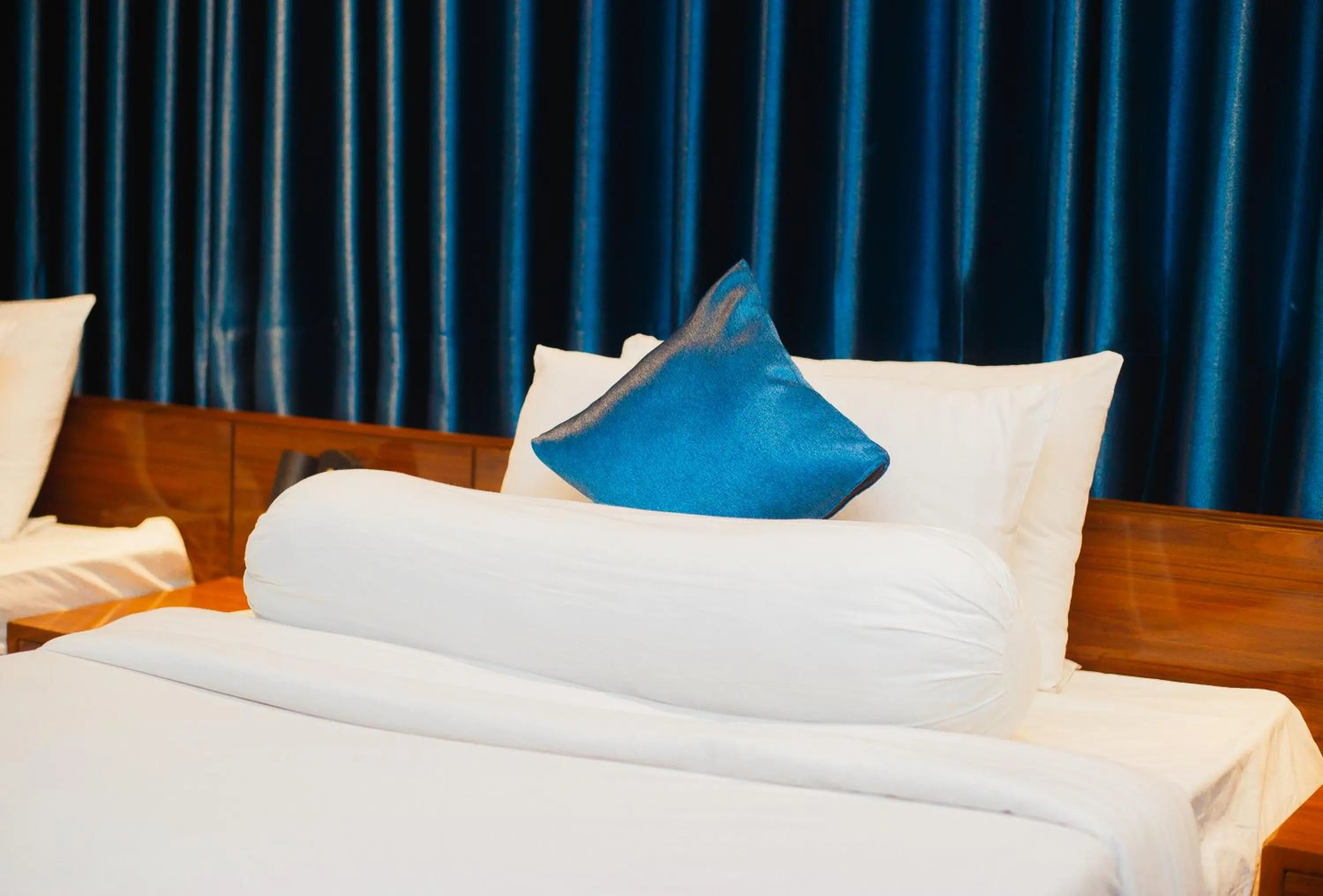 Bed in HOTEL THE CAPITAL LTD.