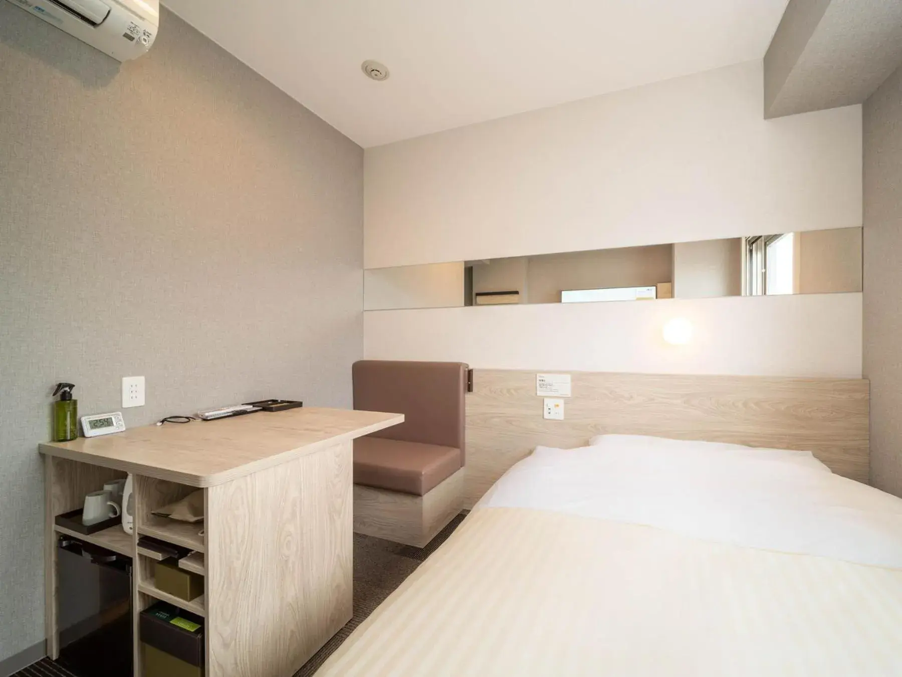 Bed in Super Hotel Premier Obihiro Ekimae Bed in Super Hotel Premier Obihiro Ekimae