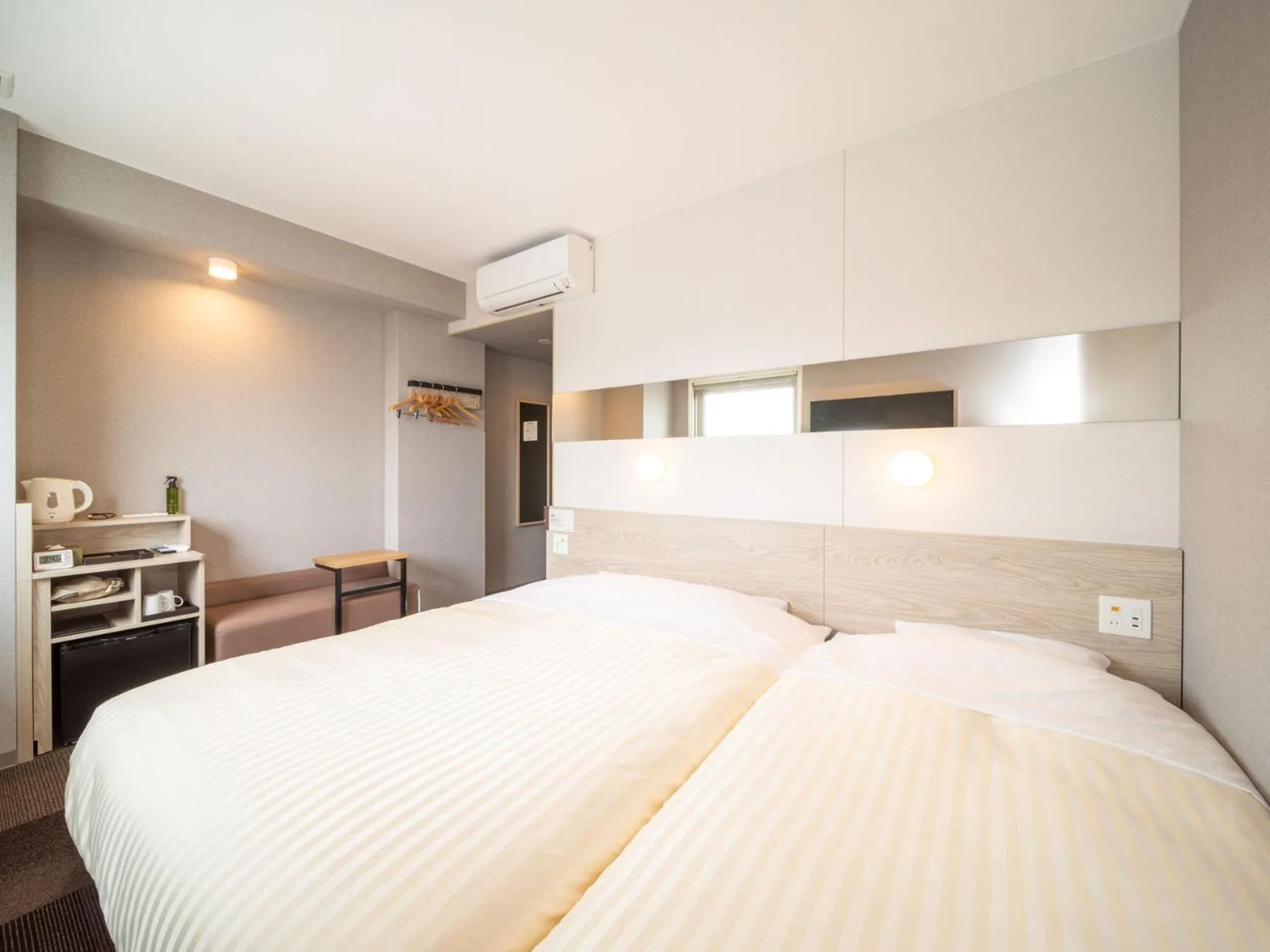 Bed in Super Hotel Premier Obihiro Ekimae