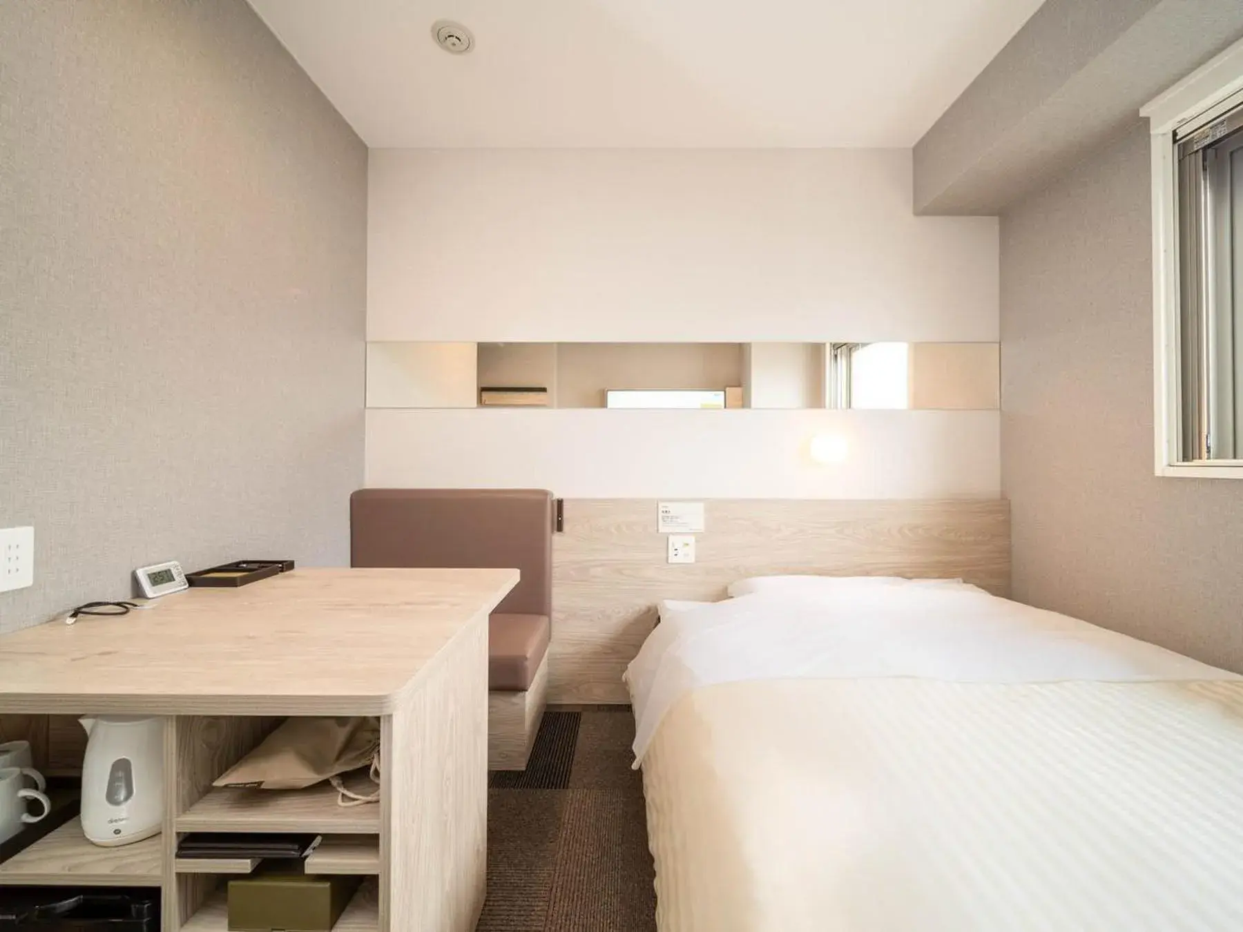 Bed in Super Hotel Premier Obihiro Ekimae Bed in Super Hotel Premier Obihiro Ekimae