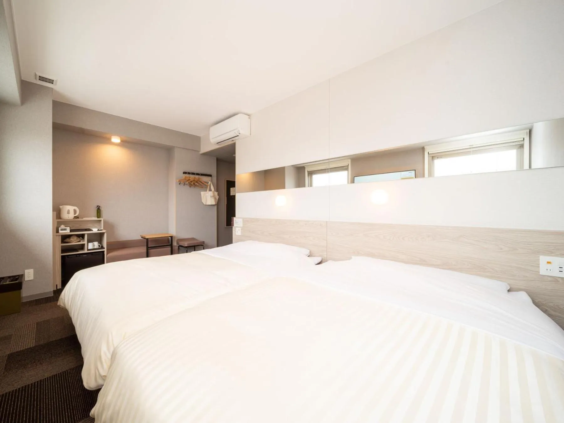 Bed in Super Hotel Premier Obihiro Ekimae