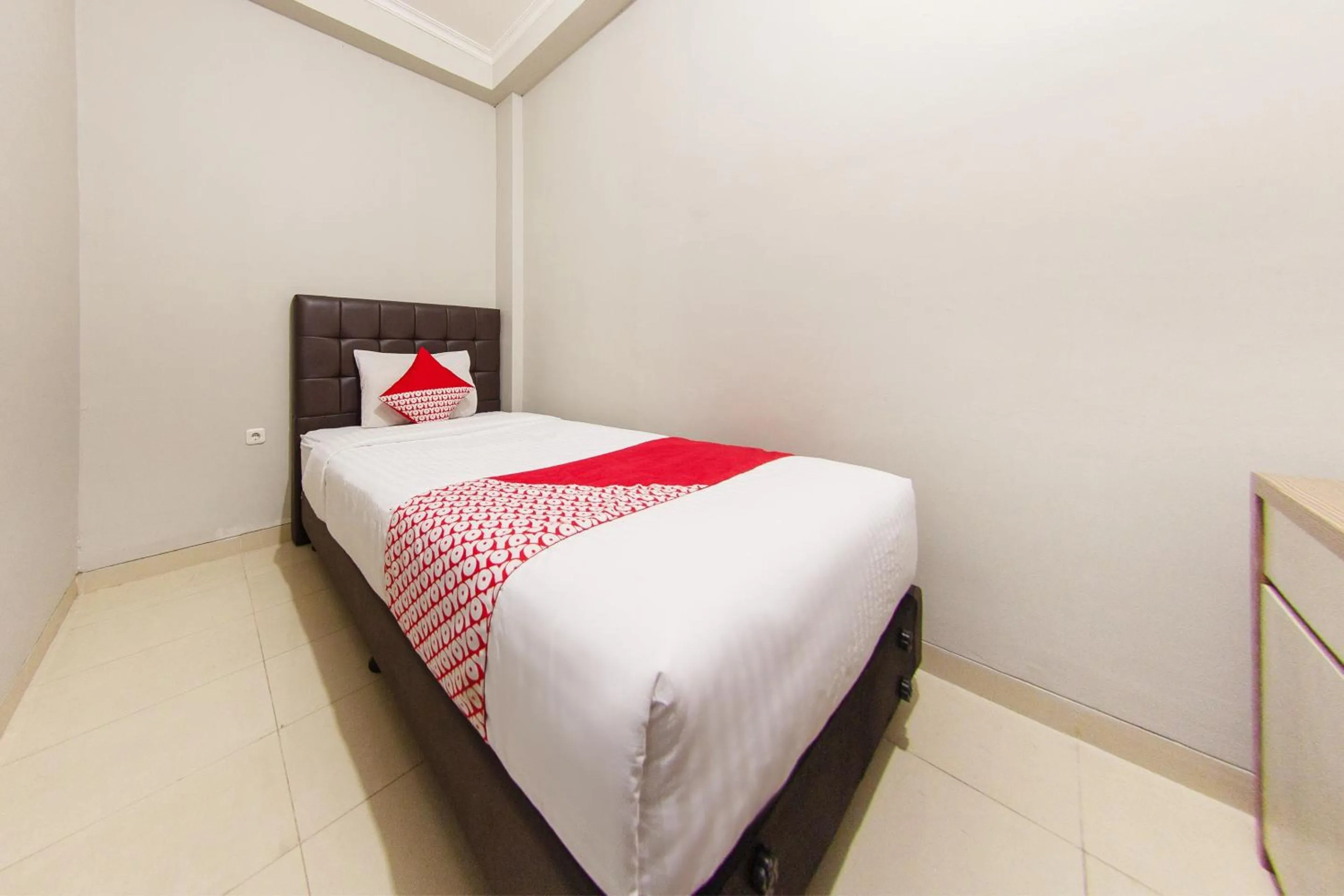 Bedroom in OYO 657 Elite Residence 71