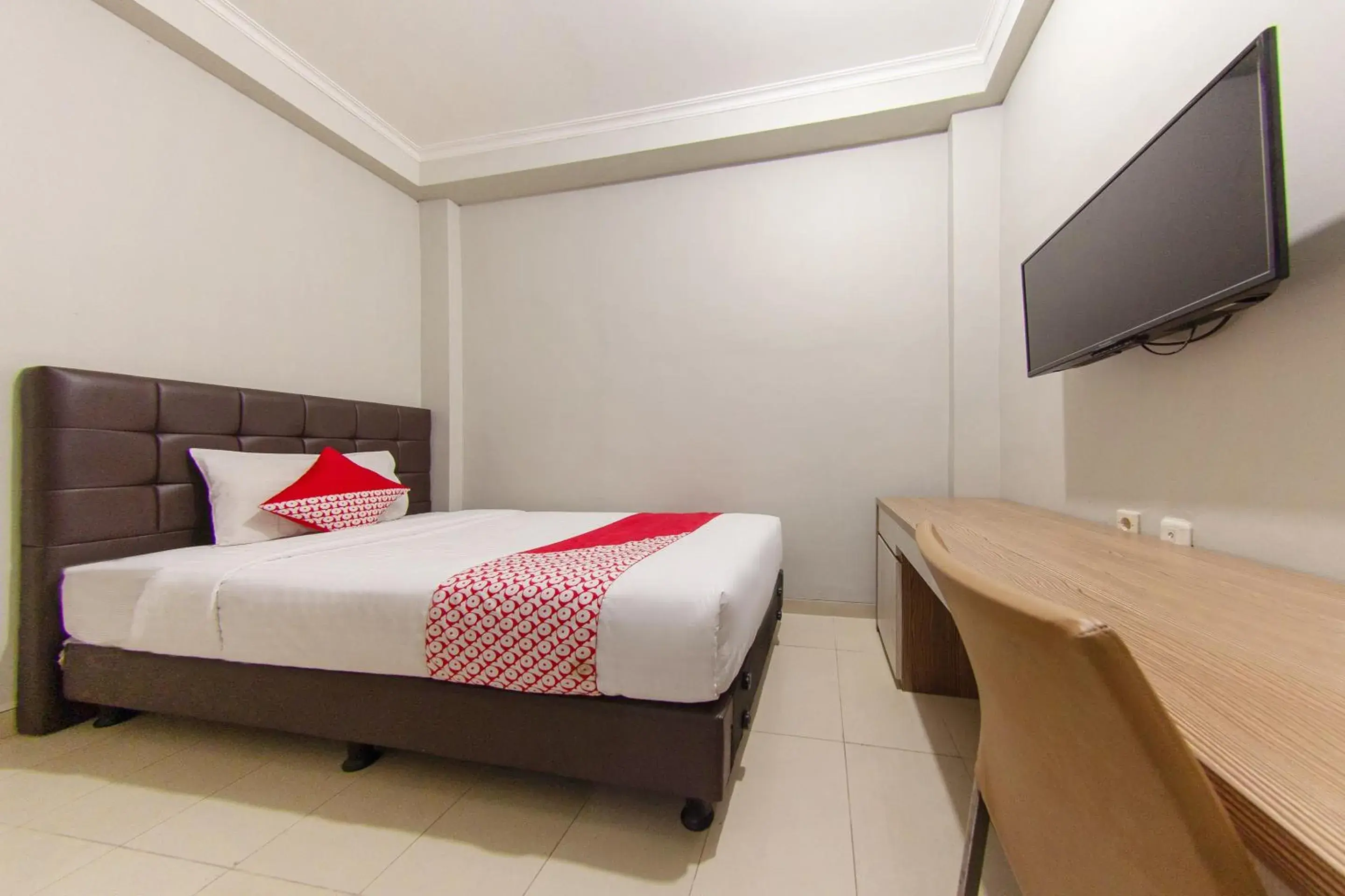 Bedroom in OYO 657 Elite Residence 71