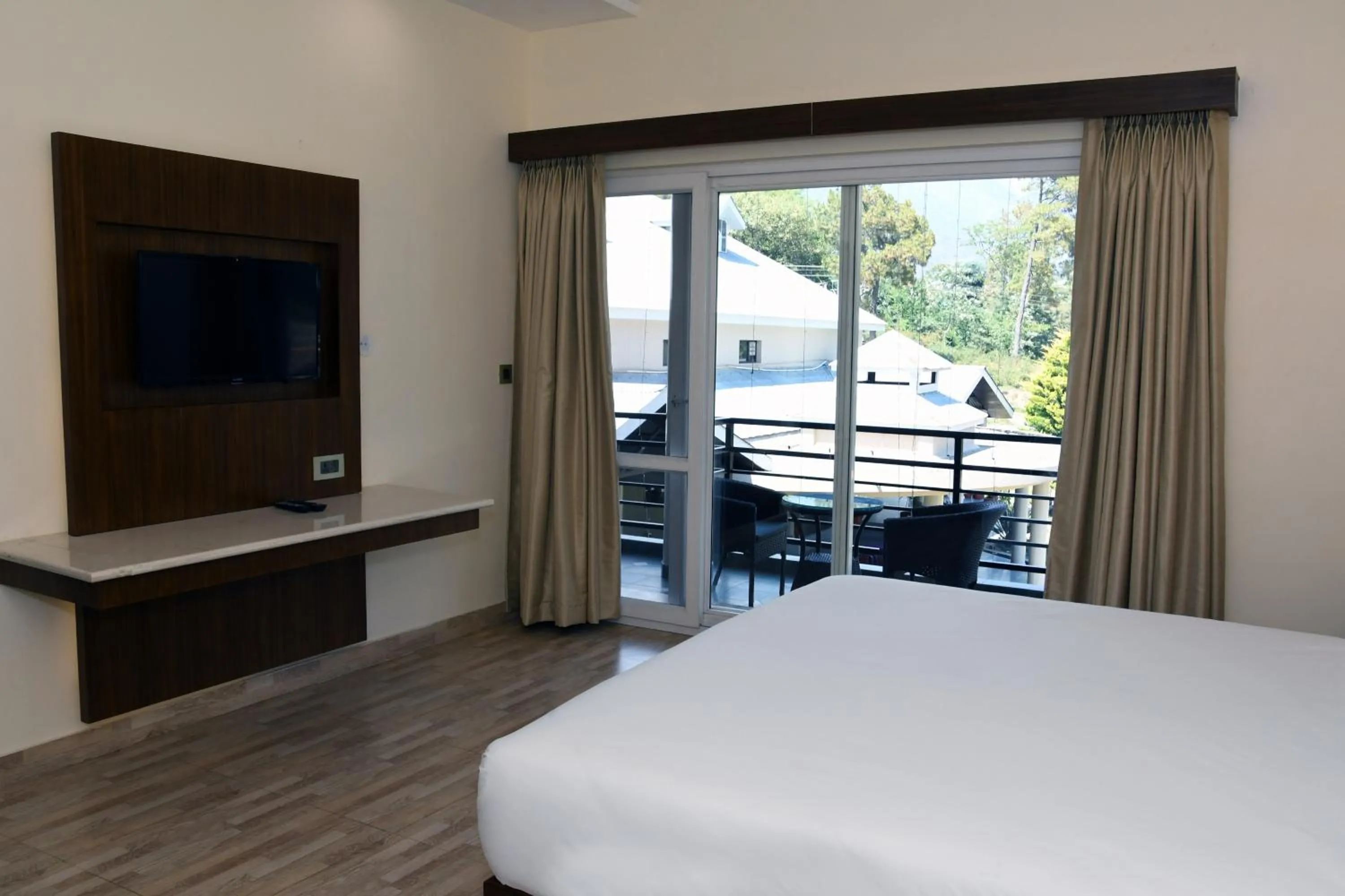 Photo of the whole room, Bed in Mastiff Villa Camellia by OTHPL