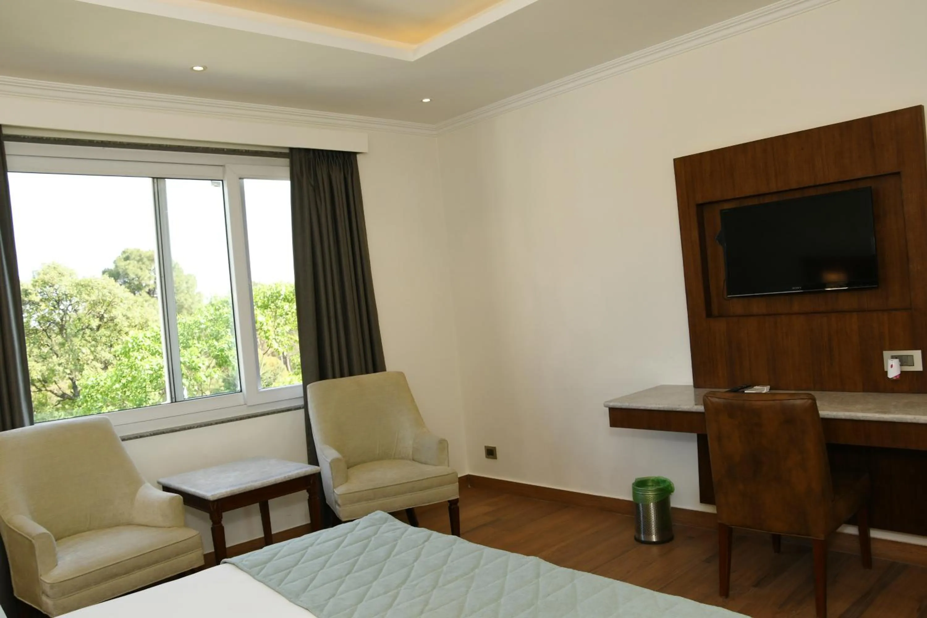 Photo of the whole room, Bed in Mastiff Villa Camellia by OTHPL