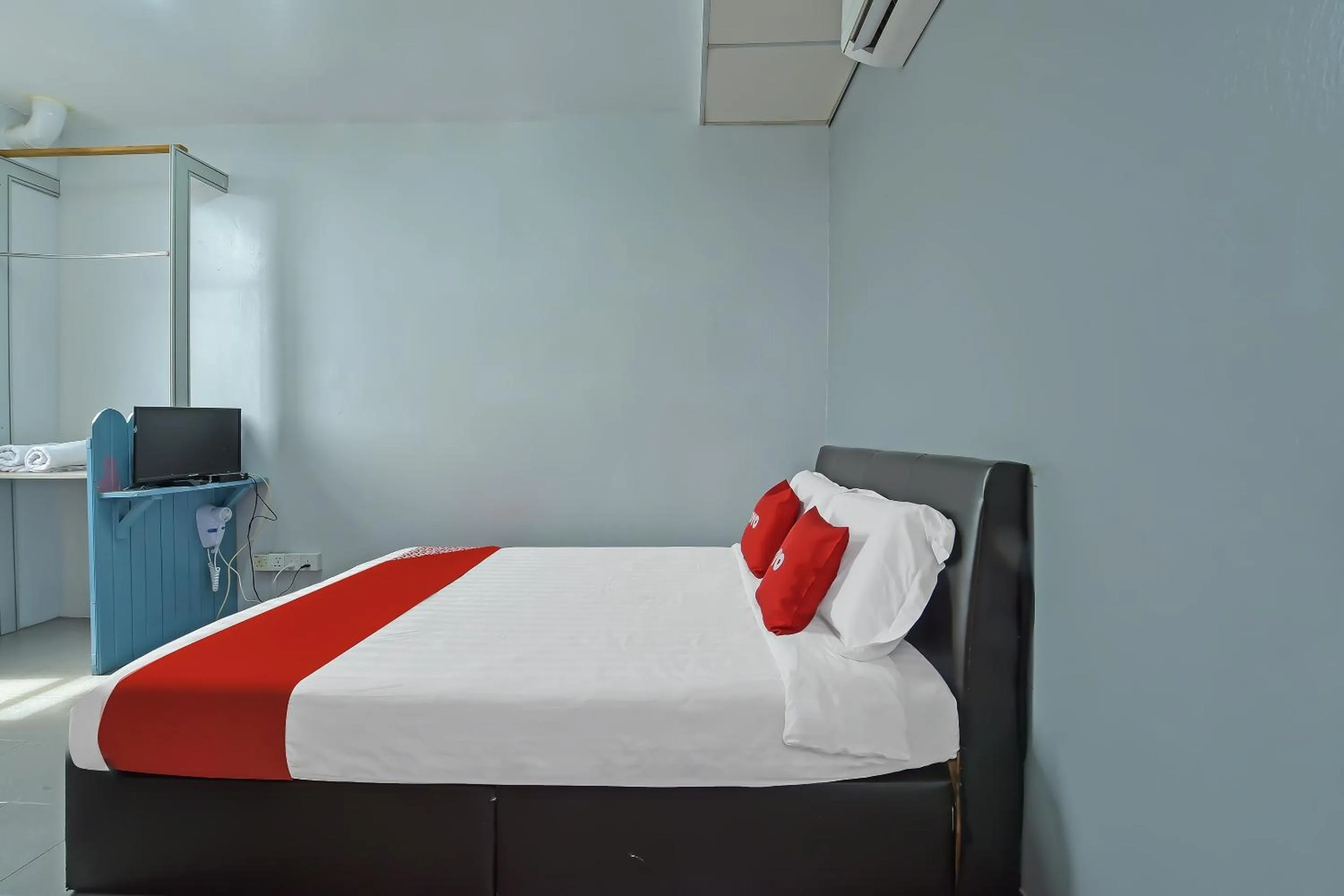 Bedroom, Bed in Hotel O Purple Town