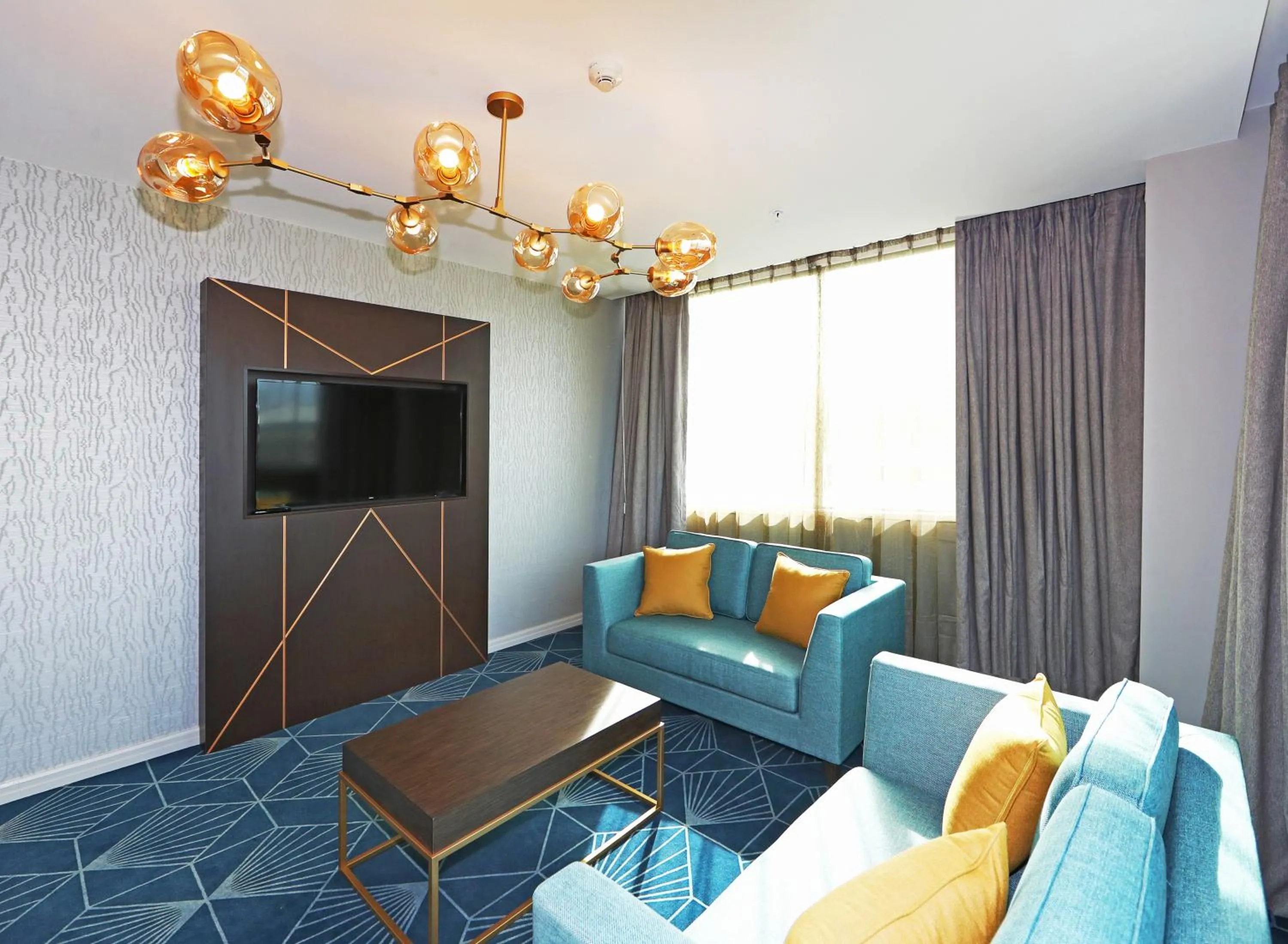 Living room in Swiss-Belhotel Napier