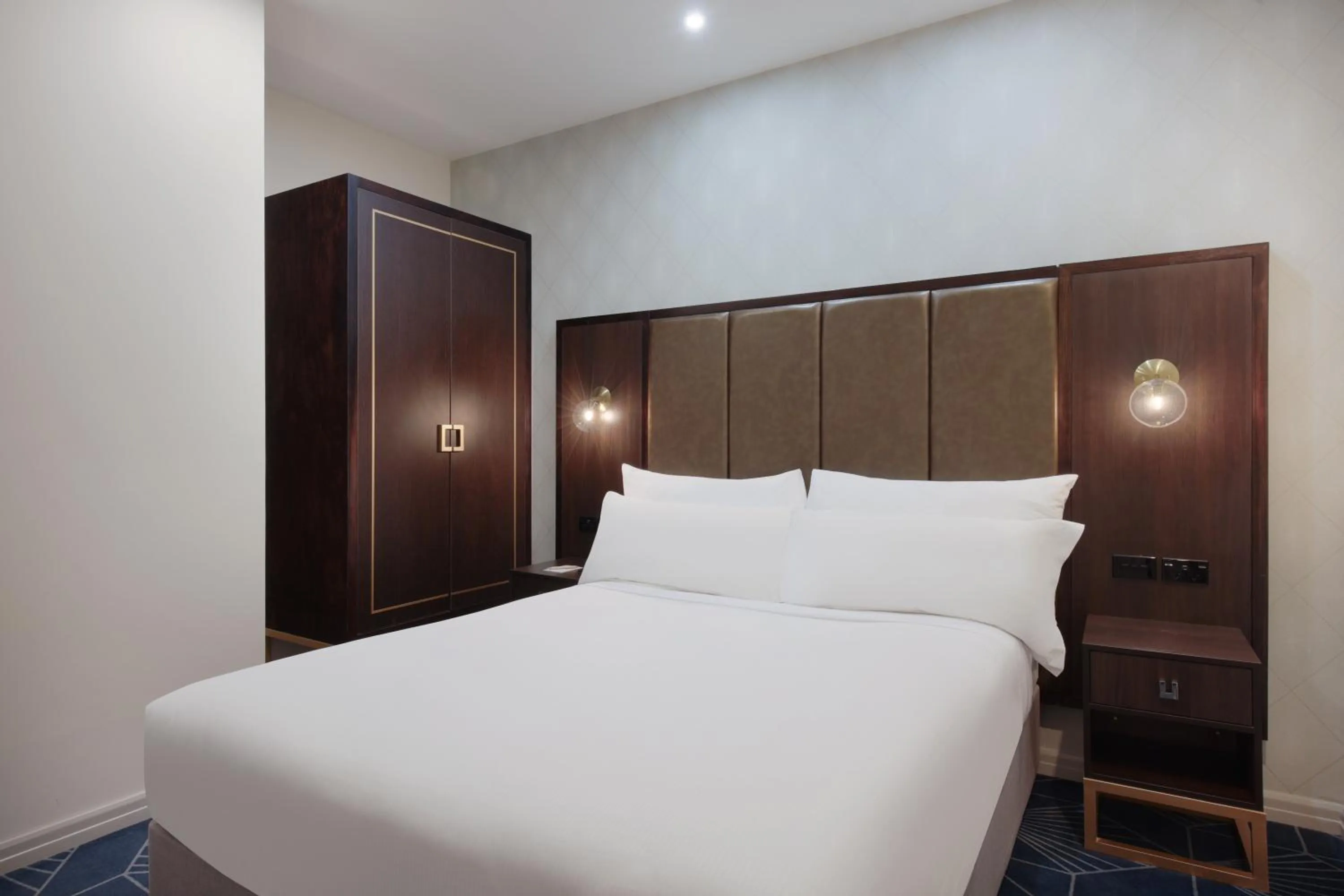 Bed in Swiss-Belhotel Napier