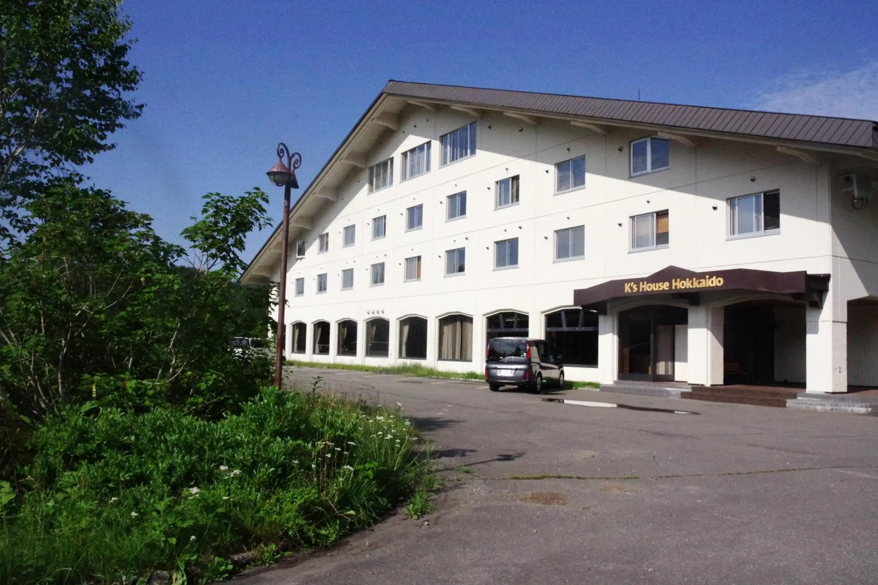 Property building in K's House Hokkaido - Asahidake Onsen Hostel Property building in K's House Hokkaido - Asahidake Onsen Hostel