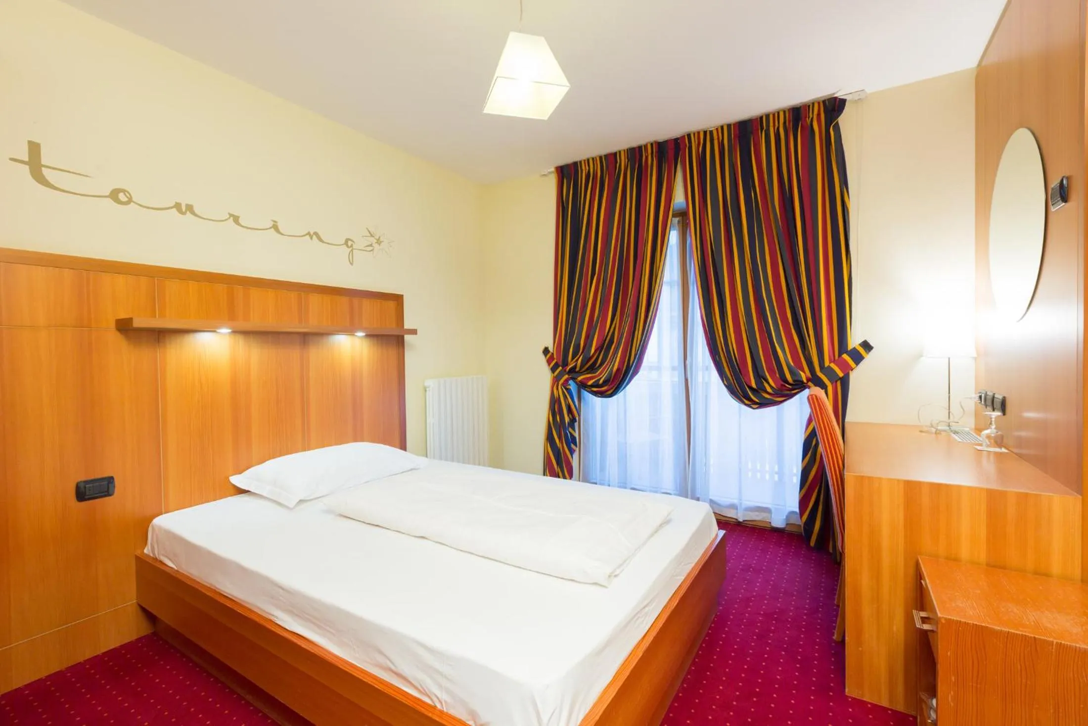 Bed in Hotel Touring