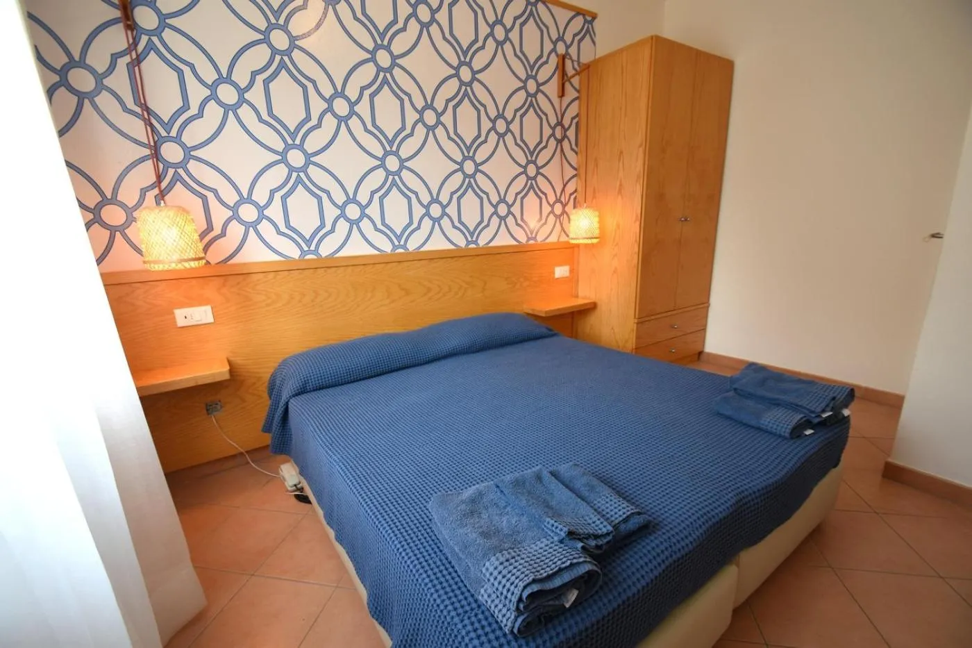 Bedroom in Hotel la Conchiglia