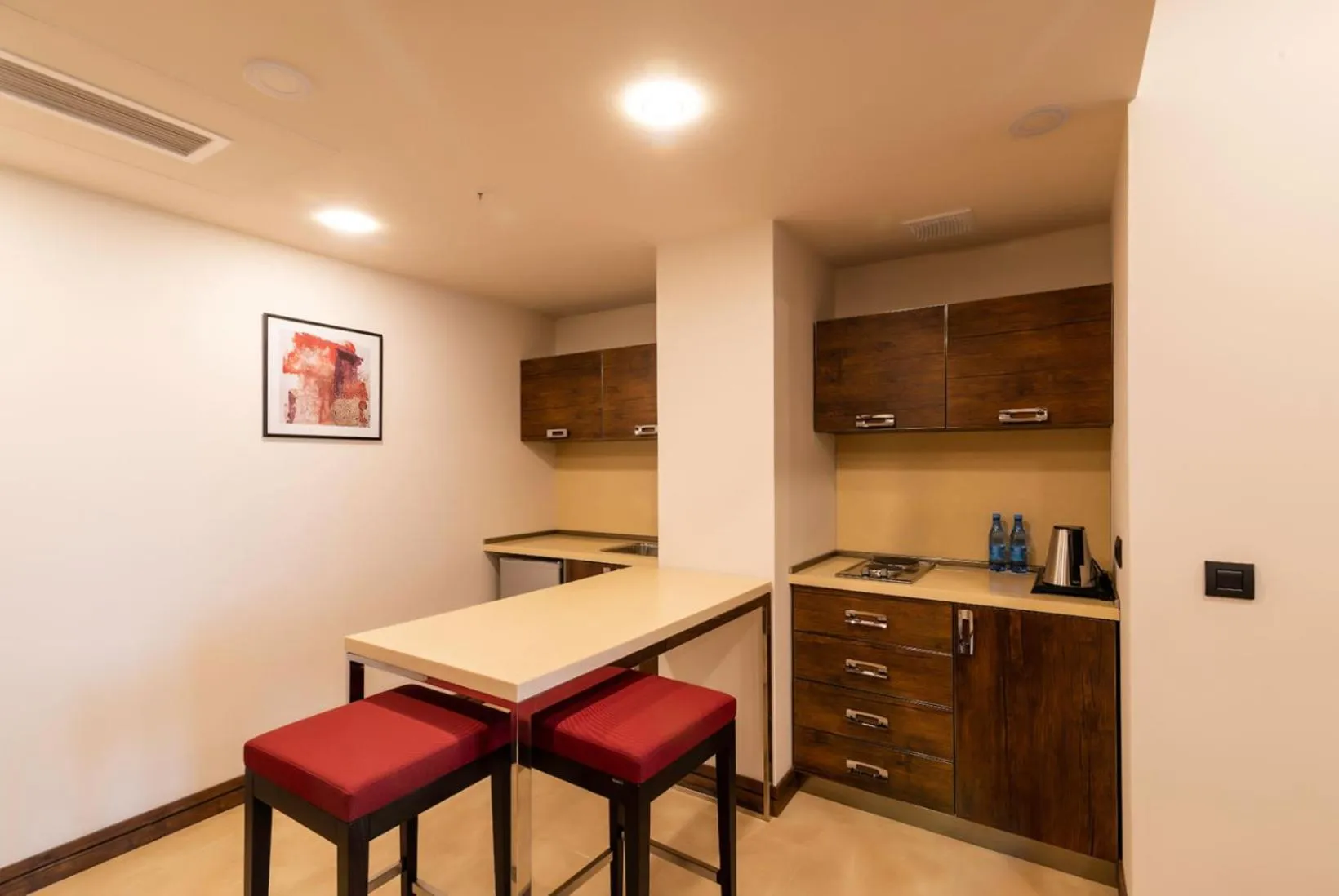 Kitchen or kitchenette in Ramada Hotel & Suites by Wyndham Yerevan