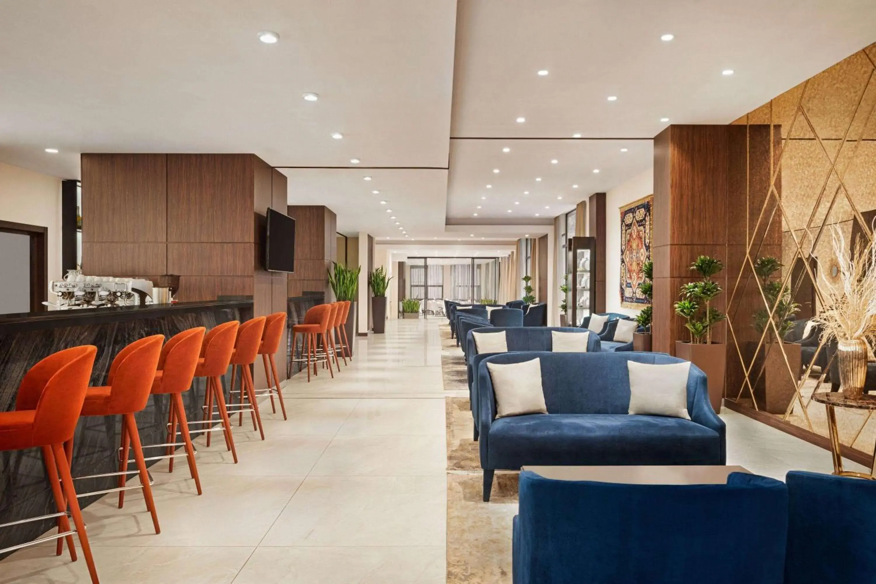 Lounge or bar in Ramada Hotel & Suites by Wyndham Yerevan Lounge or bar in Ramada Hotel & Suites by Wyndham Yerevan