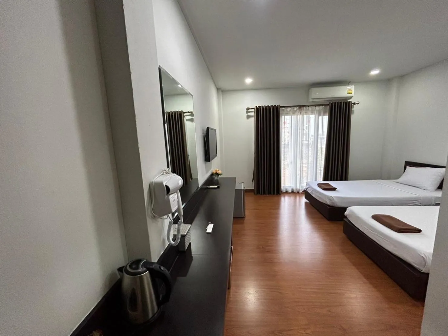 Communal lounge/ TV room, Bed in Bordin Hotel