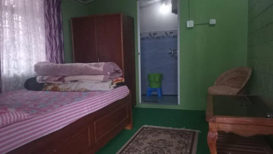 Bed in Sanjeema Tea Estate Homestay