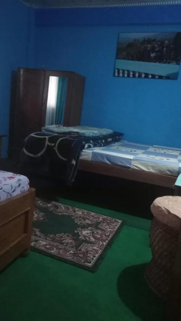 Bed in Sanjeema Tea Estate Homestay