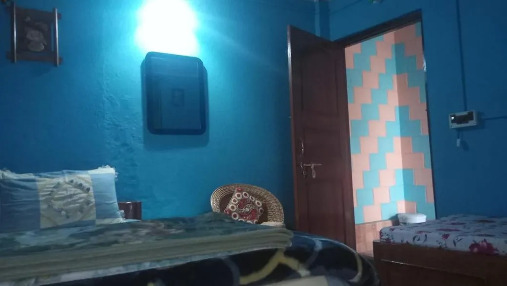 Bed in Sanjeema Tea Estate Homestay