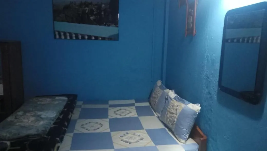Bed in Sanjeema Tea Estate Homestay