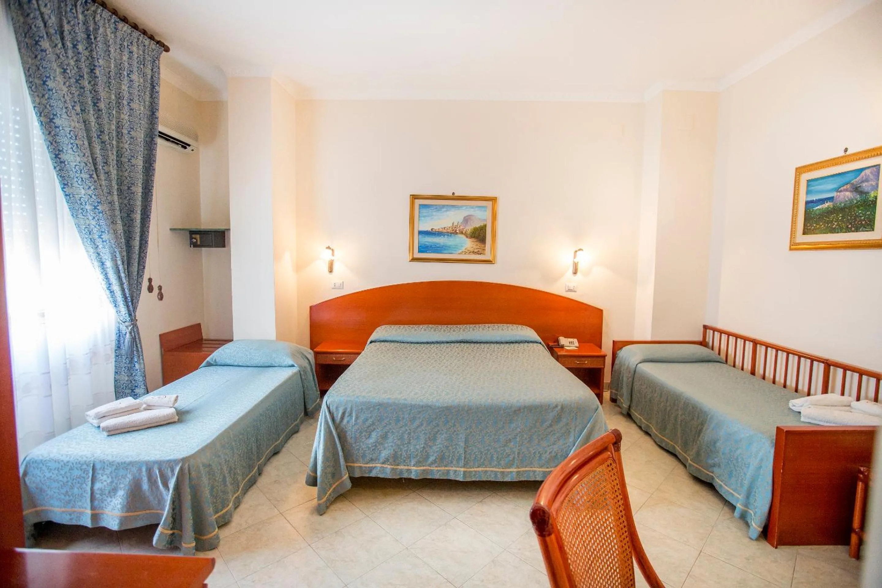 Bed in Hotel Mediterraneo