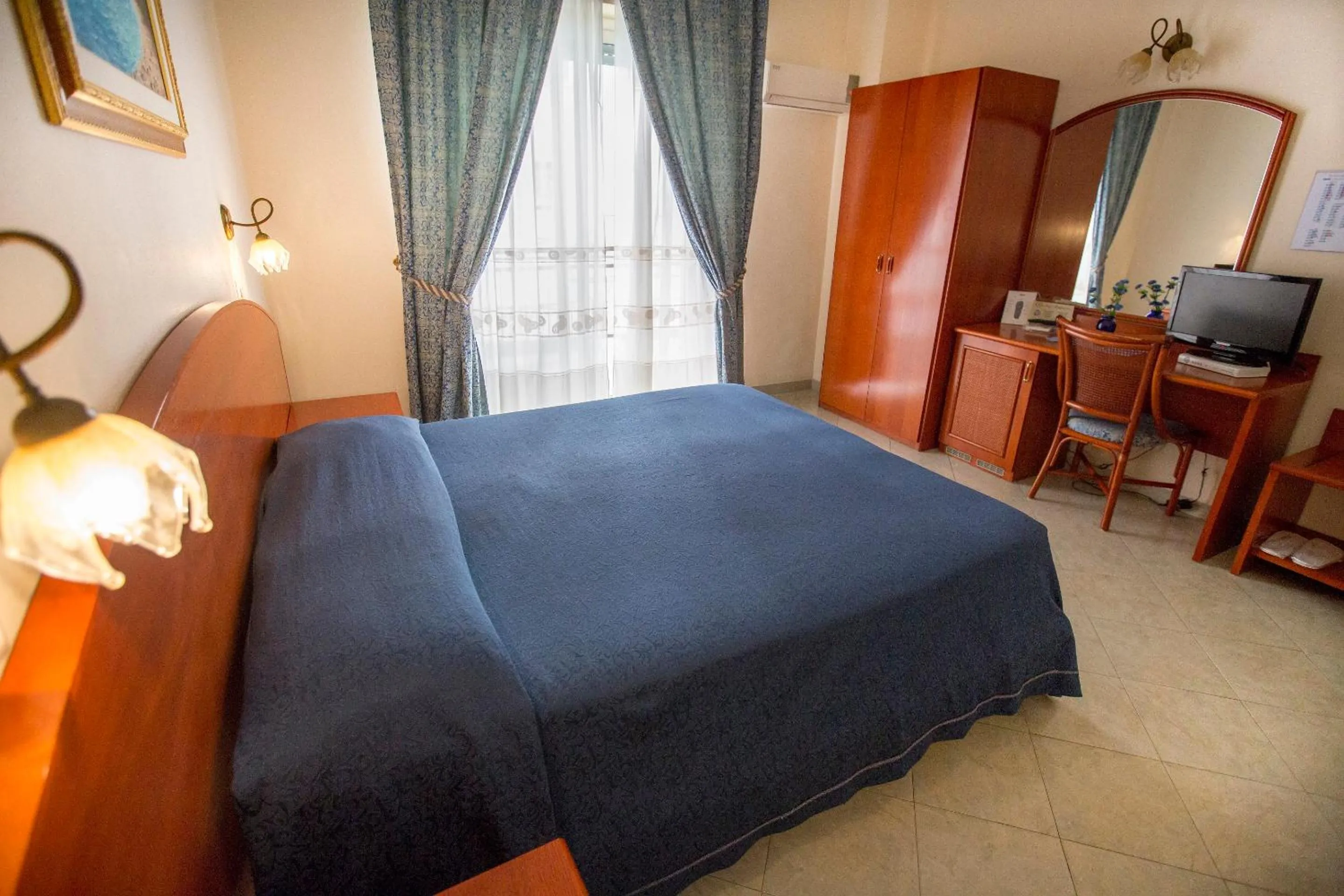 Bed in Hotel Mediterraneo