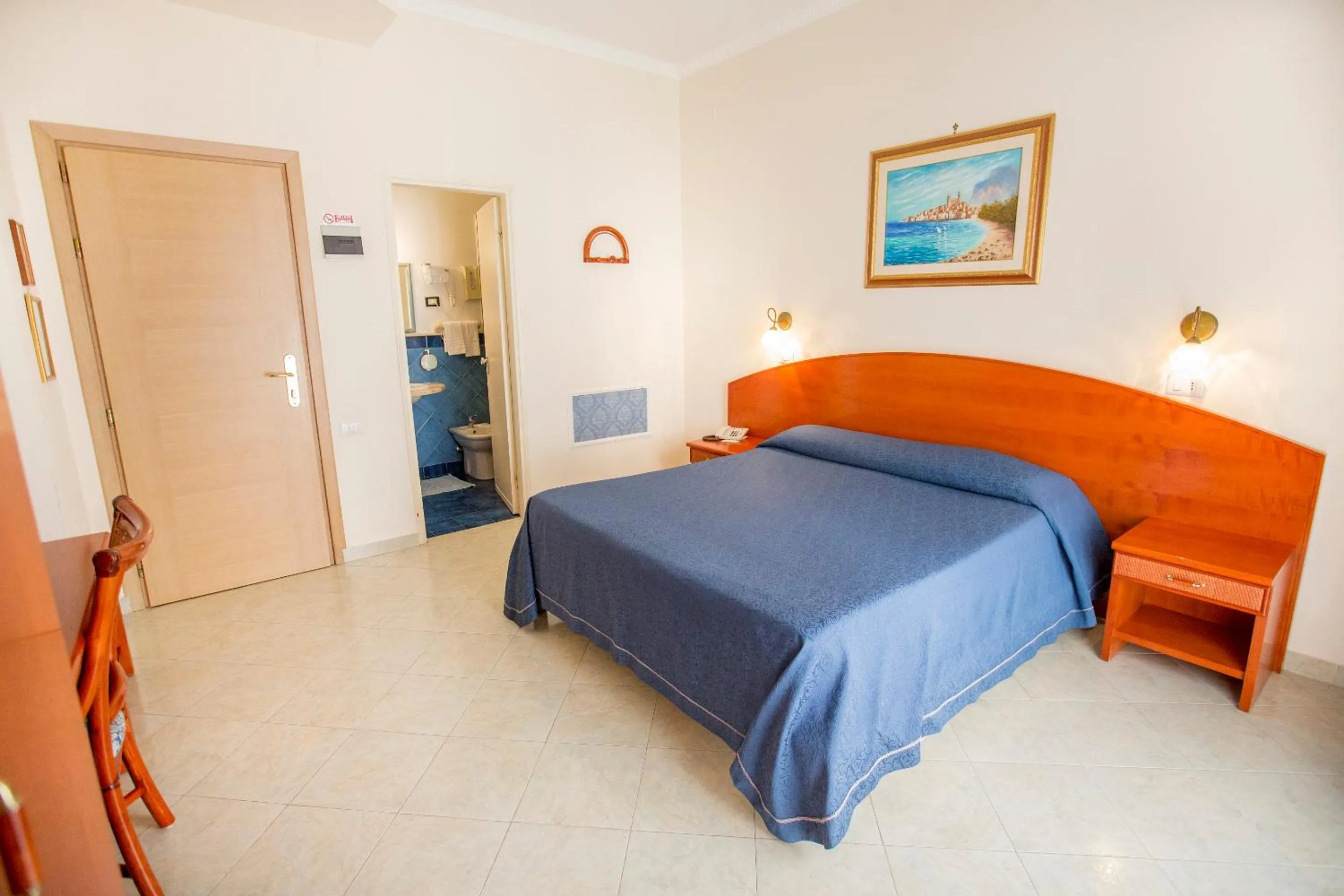 Bed in Hotel Mediterraneo