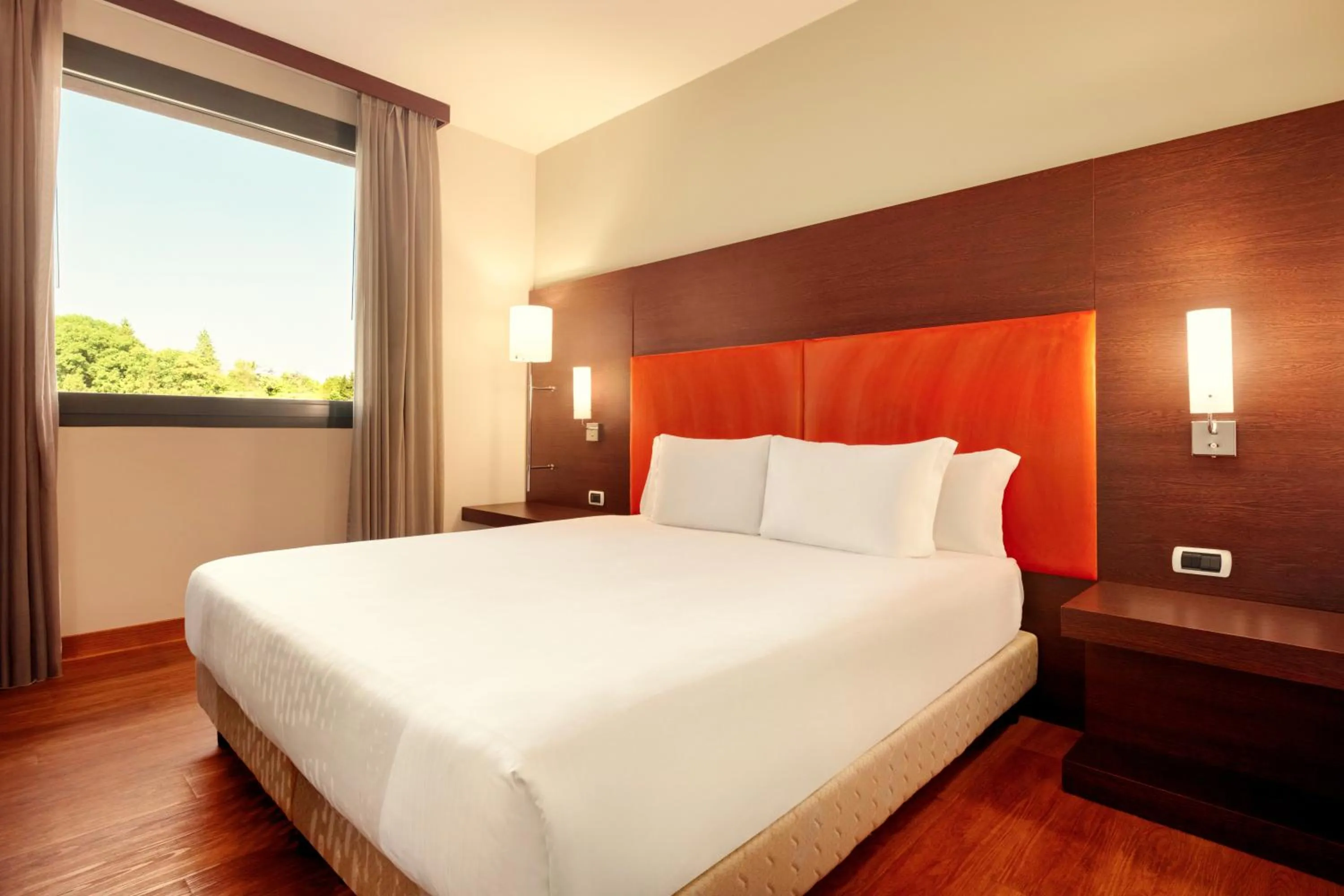 Bed in Zeus Essence Dolce by Wyndham Milan Malpensa