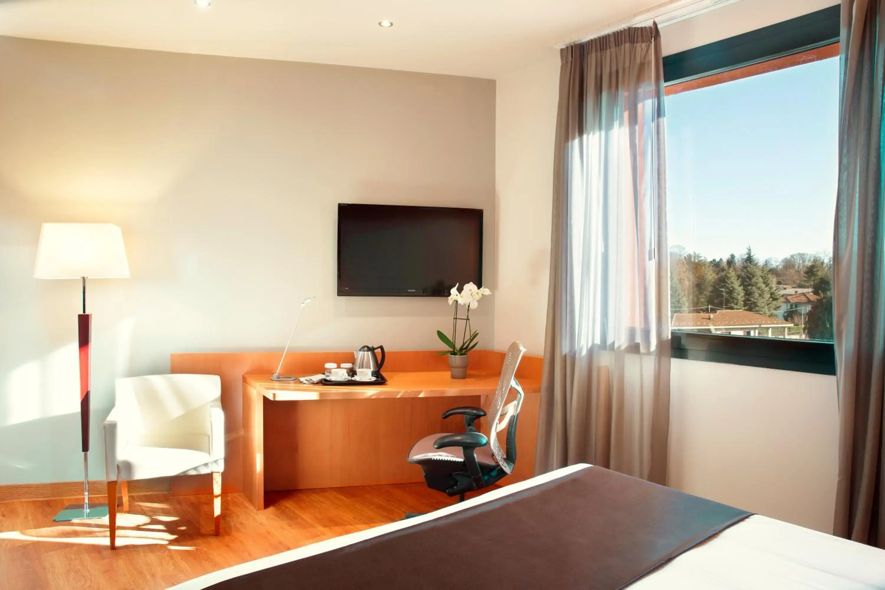 Bed in Zeus Essence Dolce by Wyndham Milan Malpensa Bed in Zeus Essence Dolce by Wyndham Milan Malpensa